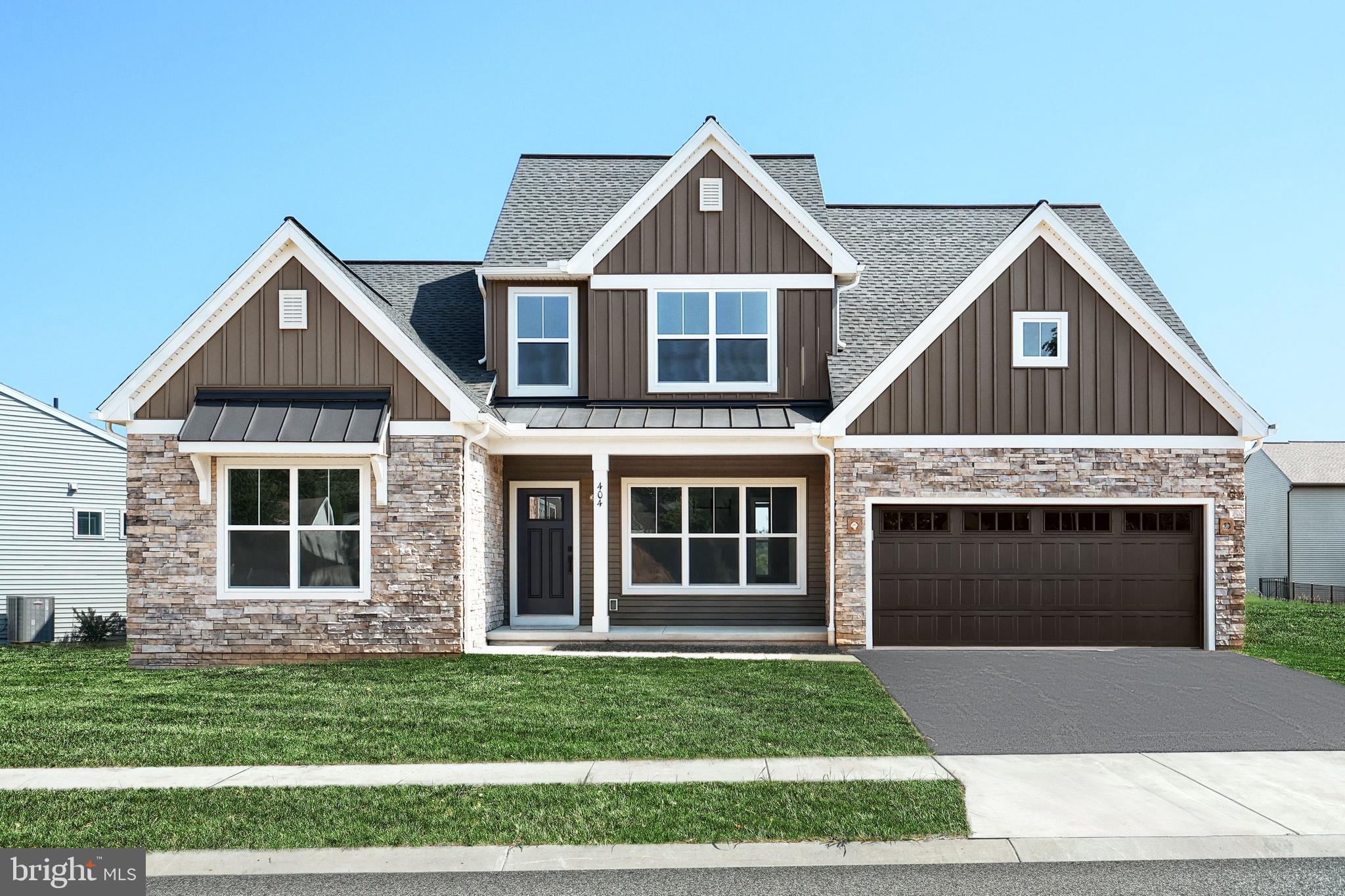 This thoughtfully designed 2-story home with a first-floor owners’ suite features an inviting front porch and a grand 2-story foyer and family room. The 2-car garage opens to a spacious mudroom complete with a built-in bench seat and laundry room access. Stylish vinyl plank flooring flows throughout the main living areas with a carpeted study to the front of the home. A formal dining room to the right of the foyer stands out with a beautiful accent wall and a tray ceiling with crown molding. The kitchen, well-appointed with stainless steel appliances, quartz countertops, a tile backsplash, and large island and pantry, opens to a sunny breakfast area with access to the rear patio. Adjacent to the kitchen is the bright family room warmed by a gas fireplace with floor to ceiling stone that makes a stunning focal point in the room. The spacious owner’s suite on the first floor includes a private bathroom with a tile shower, double bowl vanity and an expansive closet. On the 2nd floor are 2 additional bedrooms, a full bathroom, and loft space. (The floor plan shown represents the standard layout for this home plan. Actual layout, features, and options may vary. Construction plans take precedence over artwork. Please see the Community Sales Manager for details.)