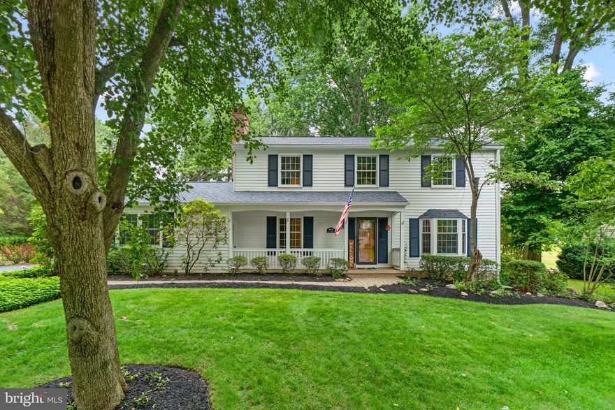 Perched on a park-like .46 acre homesite in the vibrant Dunloggin community is this pristine colonial rich with tradition, tasteful upgrades and finishes featuring a living room adorned by a bay window and custom shelving, and a well-trimmed dining room ready for intimate supers and celebratory dinners. Entertaining is a  breeze in the family room boasting a wood burning fireplace, exposed beams, a ceiling fan, crown molding and easy access to the kitchen. Pristine cook's kitchen features gleaming hardwoods, quartz counters, stainless steel appliances, raised frame white cabinetry, and an open breakfast room with a glass slider leasing to a rejuvenating 10X13 three-season room, party-sized deck, a serenity garden and backyard. Adding to the entertainment value is the finished lower level complete with rec room, a wet bar and custom built-in shelving, a half bath and plenty of storage space, and a walk-up to the deck and yard.