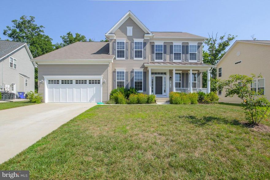 Gorgeous 4BR/3.5Bath home just under 4000sft boasting full front porch, gourmet kitchen w/granite, center island w/gas cooktop & SS appliances. Large family room w/fireplace & open floorplan. Addl rm on main lvl. Spacious master bedrm w/HUGE walk in closet & luxury bath. Finished bsmt w/recessed lighting, outside access & TONS of storage. Fenced & flat yard. Great location for shopping/dining.