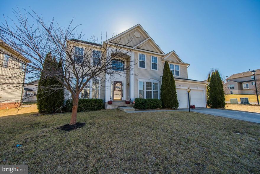 Don't miss out on this gorgeous 4 BR 3.5 BA Colonial offering crown molding & hardwood flooring! Come into this welcoming sun lit home and relax in the huge family rm! Open kitchen perfect for entertaining. Enjoy the spacious Master BR  & sitting room with a double sided fireplace! . Beautiful fully finished basement w/Theatre Room! Nicely fenced corner lot that offers a large deck & patio!