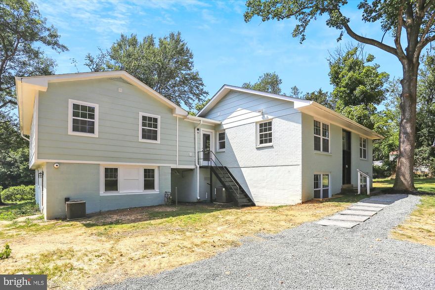 Spectacular 1AC + lot! Ideal for contractor home business with ample parking. The main house is designed for a large family with private living arrangements.
Enter to a split foyer leading up to living room with a cozy fire place, new kitchen, dinning combination, two bedrooms,new bathroom.
Landry and mud room.
To the left you have a private two bedroom two bathroom living area for living dining combination and a kitchenette with appliance connection.
Downstairs a in law suite with two bedrooms, full bathroom, living room and a kitchenette with appliances connections.
Two zone HVAC.
Off Route 29 and Briggs Chaney Rd. Shopping, Metro, Hospital near the property.