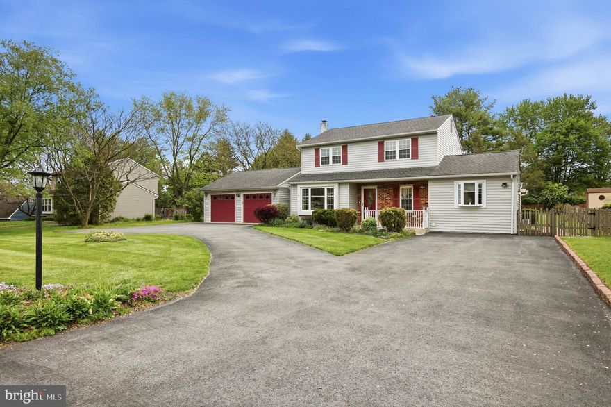 Welcome to 328 Courtland Avenue—a home that perfectly balances convenience and tranquility. Just minutes from Main Street in Harleysville, you’ll enjoy easy access to all of the things you need while being surrounded by rolling hills and open green space.  
This classic two-story home offers four bedrooms and three-and-a-half bathrooms.  But what truly sets this property apart are the things that are hard to find in a home: a private in-law suite, a beautifully maintained flat and fenced backyard, a large screened-in porch, an oversized attached two-car garage with three garage doors, and an expansive driveway with parking for six or more vehicles.
Step inside to a bright and inviting living room, highlighted by an oversized picture window that fills the space with natural light. The seamless flow leads into a combined dining and kitchen area, perfect for both everyday dining and hosting gatherings. The dining space easily accommodates family meals, with additional seating available at the kitchen island. The kitchen features custom cabinetry in a warm wood tone, upgraded countertops, and a stylish backsplash.
Just beyond, the sunken den offers a cozy retreat, complete with ceiling beams and a charming brick fireplace—an ideal setting for quiet evenings. Also on the main level are a powder room and a sun-lit laundry room with ample storage.
A true highlight of the home is the main-floor fourth bedroom with its own private ensuite bathroom and separate exterior entrance. This versatile space is perfect for an in-law suite, au pair accommodations, or a private home office.  With this addition, the estimated total above grade square feet is 2430.
Upstairs features a primary bedroom with a walk-in closet and a private ensuite bath. Two additional bedrooms and a full hallway bathroom complete the second floor. The partially finished basement adds even more flexibility, offering the perfect space for a recreation room, gym, or media area.  Schedule your showing today!
