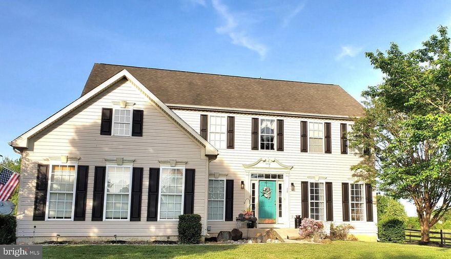 WELCOME HOME!!!  
These are the original owners of this home having it built in 2004 and are now ready after lovingly maintaining it to downsize.    Enter through the front door into the 2 story Foyer with hardwood flooring and tear drop waterflow staircase.   The Powder Room is on your left and Living Room on your right.  Follow through the foyer to your Gourmet Kitchen  with 42" gorgeous cherry kitchen cabinets, center island  and entrance to the Formal Dining Room that is conveniently open to the Living Room.    The kitchen is also open to the adjacent Family Room.  If that isn't enough, there is a 20 x 20 finished area off the back of the property for huge gatherings as a Bonus Room.    This trifecta of living space creates all the room you need for both intimate and large gatherings.   The main Laundry/Mudroom is situated between the garage entry and Foyer.  Upstairs are  4  nicely sized Bedrooms with the Primary Bedroom being a private oasis with double door entrance and 4 piece bathroom en suite that includes both a tiled stall shower and large soaking tub.   Another nicely sized bath is located off the upstairs hallway.   The majority of the basement is unfinished to create whatever your heart desires with one room sectioned off to include both a window and HVAC.   With almost an acre of land, the backyard is private and allows you plenty of space for recreation. 
 Not only is this a beautiful home but the location of the community AND the house is amazing.  This home backs up to hundreds of acres of farmland and is surrounded by Open Space parcels on the side and front of the property.    Pelham Manor is located off Rt 213 in the rural outskirts of Elkton and within a mile of MD/DE state line for tax free shopping.   Historical Chesapeake City is less than 5 miles South with its many scenic waterfront restaurants, shops and marinas.   This location is an hour drive to Baltimore, 2 hours to Washington DC in one direction and an hour to Philadelphia and 2 hours to New York City in the other direction.  I-95 runs through the area for easy access and an easy commute.  The Chesapeake City/ Bohemia Manor school district as the smallest district of the county is sought after throughout the community,