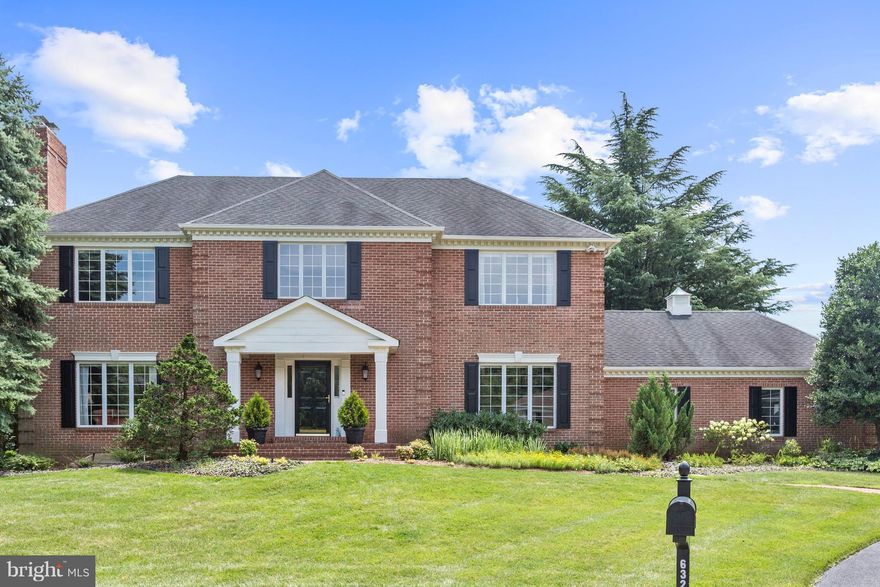 Beautifully updated center hall Colonial in prime location on cul de sac just minutes to GW Parkway. Designer appointments throughout. Two-story foyer w/ curved staircase. Open gourmet kitchen & family room w/ stone fireplace & walls of windows. Master spa-like bath. Library w/ built-ins, 3 fireplaces, walk-out lower level. Private fenced backyard & deck. Walk to Potomac School & Clemyjontri Park.