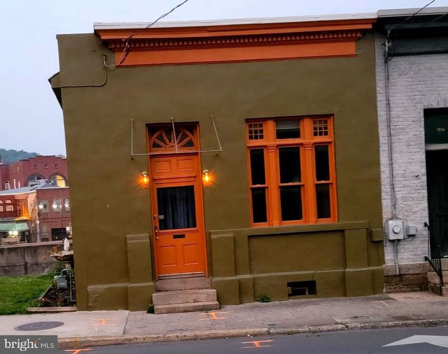 LOCATION LOCATION LOCATION.  HOT CORNER WITH TREMENDOUS FOOT AND VEHICULAR TRAFFIC.  OVERLOOKS WILLS CREEK WESTERN MARYLAND SCENIC RAILROAD AND BEAUTIFUL DOWNTOWN CUMBERLAND.  CUMBERLAND IS CURRENTLY GOING THROUGH A MASSIVE TRANSFORMATION.  HAS GAS HEAT CENTRAL AC WITH 2 LEVELS.  ONLY STEPS AWAY FROM THE C AND O CANAL.  GREAT ALLEGANY PASSAGE TRAIL.