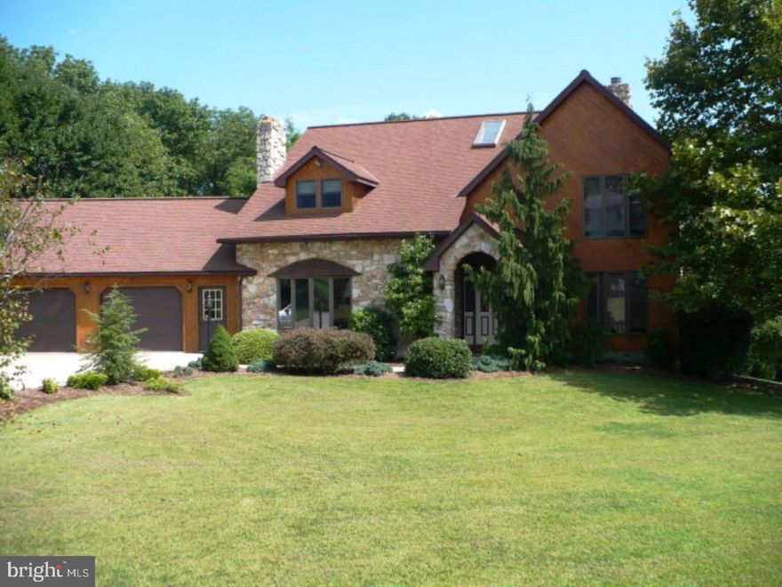 Spacious home, large 44 handle eat-in kitchen, sunken living rm w/fireplace, formal dining rm, large master suite w/ fireplace, master bath w/ whirlpool tub, full bath in each bedroom, 2 bedrooms have private lofts w/ skylights, finished lower level w/ bar and full bath, open stair case, brand new furnace January 2010, tiered deck, private back yard, 2 car attached garage. A must see!  <marquee> PRIVACY </marquee> Mailing Address Continued: Orwigsburg Color: Tan Amp: 200