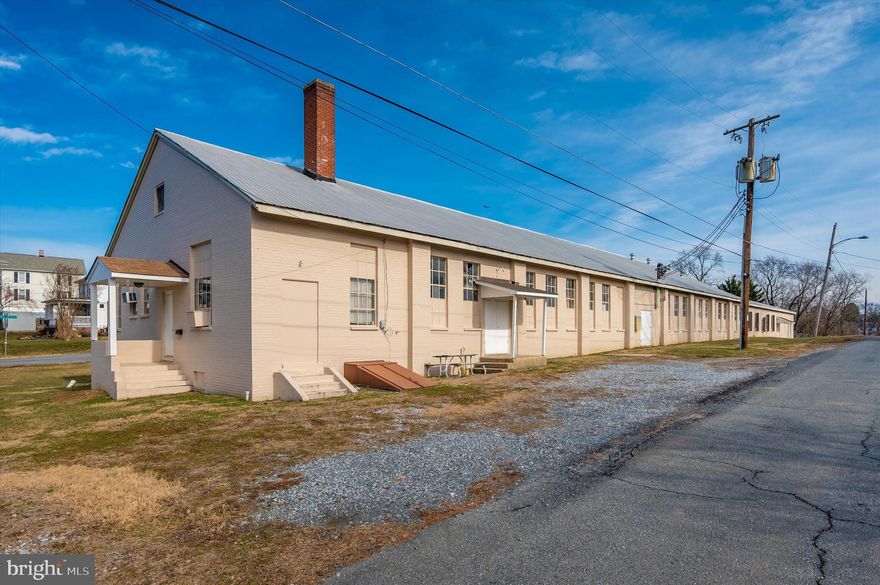 Rare opportunity to purchase this 12K ± SF Industrial warehouse on 1.12 acres, zoned Industrial.  Great redevelopment site with potential for residential infill or plug & play for contractors.  Previous woodworking shop.  Surrounded by residential communities.   Located in an Opportunity Zone.   Vacant, ready for occupancy.