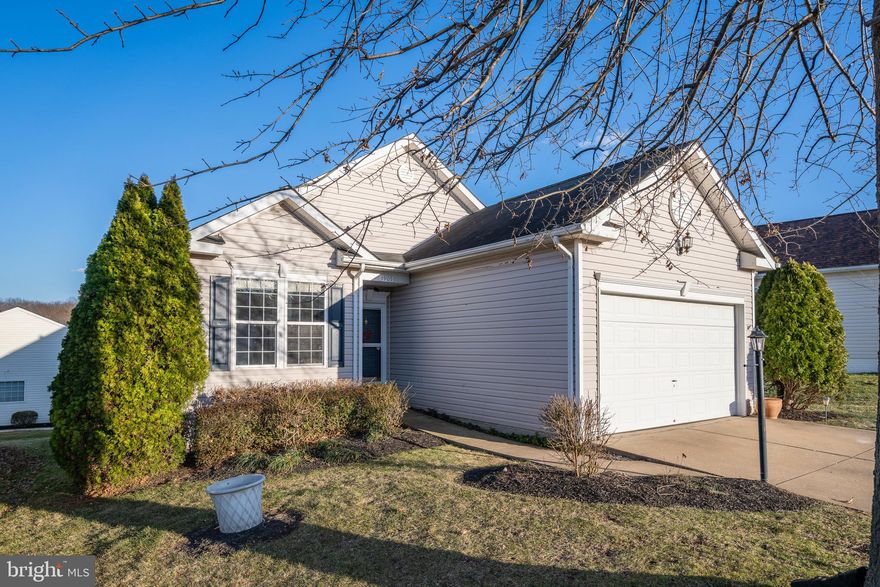 RARE OPPORTUNITY is now available in the Four Seasons in Historic Virginia neighborhood--  this is a wonderful, Active Adult-aged 55+ Community.   You will enjoy all of the amenities that the Four Seasons Neighborhood has to offer.  This home is spacious and bright with natural sun-filled rooms—a centrally located kitchen with a large family room, which opens to an entertainment deck.  Open concept floorplan has a primary bedroom set apart with a walk-in closet and En Suite bath.  You'll love the soaking garden tub,  double sink vanity, and separate shower.  Two additional bedrooms on this level are perfect for guests or will make for a quiet den or office.  Dining Room and Living Room are spacious and well-appointed.  Everything you need on one level plus the finished lower level offers a recreation room and a 4th bedroom with a full bathroom This would make a perfect studio, gallery, or fun craft room. Plenty of room for guests too. There is  a second family room, which opens out to a patio and to the rear yard.  So much living space and abundant storage --room to bring all your treasures as you downsize in style.  Beautiful, designer interior paint and brand New Carpeting make this a showplace.  All you need to do is move in! Our location is so close to the Clubhouse--it's walkable!  Enjoy the  HOA amenities, including a 21,500 sf Clubhouse, indoor/outdoor swimming pool, pickleball courts, tennis courts, bocce ball, various clubs, library, fitness center, and front security gate, which are all included in the HOA fee.  Venture out on the numerous walking/jogging trails located throughout the neighborhood.  You will find shopping, regional libraries, Starbucks, quaint restaurants, parks, and numerous golf courses located within minutes of the neighborhood.  This location is also so convenient to Quantico, Fort Belvoir, hospitals, Potomac Mills outlet mall, The Virginia Railway Express (VRE), and the express lanes on Interstate 95.  When you're making a smart move--this is the Natural Choice--Great Price, Excellent Location, and Sought-after Amenities team up here.