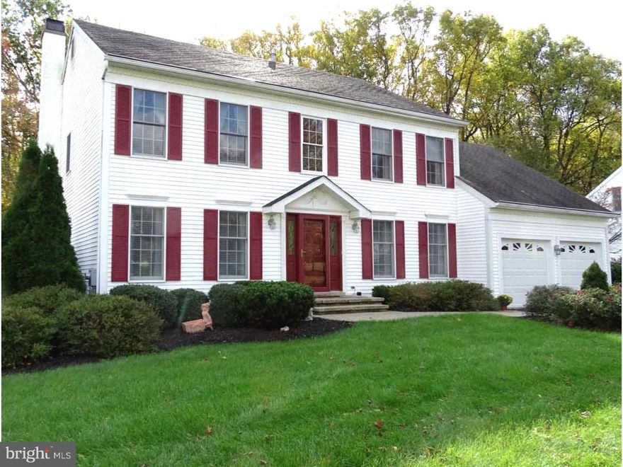 This handsome Center Hall Colonial offers it all! Enjoy your private yard backing to preserved woodland, custom designed deck, EP Henry front walk way with lighted steps, new front door, new garage doors, 2016 heater/air conditioner, gorgeously maintained landscape + enormous 2-car garage w/additional work shop space and utility sink! 2-story, hardwood floor entry opens to a large dining room + living room boasting crown molding + chair rail wood work.Glass French doors in LR open to airy family room. Family room offers fireplace, neutral carpet+ paint, a convenient wet bar space, and adjoins eat in kitchen. Bright and sunny, the kitchen boasts stainless steel appliances, cooking island + glass doors leading to spacious deck overlooking nice sized yard and woodlands. Main level laundry room w/utility tub and shelving. Lovely large master suite w/ double door entry, ceiling fan, walk -in closet +full bath w/ vaulted ceiling, sky light, + extra large soaking tub. 3 other nice-sized bedrooms + hall bath w/ double sink complete the upper level. Full basement and yard fencing complete the package! 3 minutes to Rt. 1 and 95. All in the award winning Pennsbury School District!