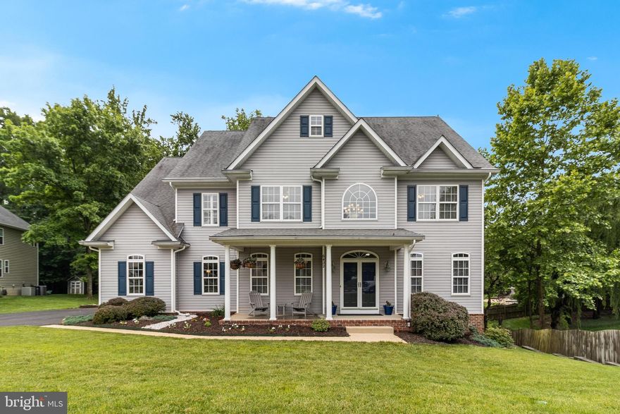 This beautiful home is truly unique and has so much to offer - including separate In-law Suite for multigenerational living!  Forget waiting to build new - this pristine home has everything you could desire and can be yours now.  Located in the sought-after neighborhood of Montrose Pointe, this stunning 3-Level, 2-Car Garage Colonial features 7 BR and 4 1/2 BA, with approximately 4,800 finished sq. ft of exquisite luxury.  Hardwood floors welcome you into the home's two-story foyer, and lead to an open floor plan.  The main level seems to go on forever - with an expansive Family Room, formal Dining Room, Living Room, four-season Sunroom, dedicated home Office/Bedroom, and full eat-in gourmet Kitchen with brand-new stainless-steel appliances, walk-in pantry, large island, abundant cabinets, and granite countertops. 

The 5 Bedrooms on the upper level are highlighted by the large Primary Bedroom with tray ceiling and adjoining spa-like en-suite bath.  The additional 4 Bedrooms are large and include access to 2 Full Baths, one Jack & Jill Bath, and the other shared. And the upper Laundry Room provides a convenient lifestyle. 

Possibly one of the most unique features of the home, is the fully finished In-Law/au Pair/Suite on the lower level.  It features a Living room with gas fireplace, full eat-in Kitchen with brand-new stainless-steel appliances, large Bedroom with four closets, Full Bath, separate Laundry Room, and walk-out access to a concrete patio. The lower level also features a Double ceiling with extra insulation for sound proofing, a French drain with lifetime of structure warranty, separate W/H and two sump pumps.  This is the perfect setting for generational living, guest comfort, or rental income opportunity.
 
This curb appeal of this house is enhanced by its ideal lot, with manicured lawn watered by a 7-zone inground sprinkler system.  Enjoy the peace of the outdoors on the large deck spanning the back of the house, the front covered porch, or the two patios.  Perfect location blending comfort; with access to scenic hiking trails, kayak launch, and the Potomac River, and convenience; within minutes to NSF Indian Head, and direct commuting routes to Washington DC, Northern VA, Joint Base Andrews, National Harbor, etc.