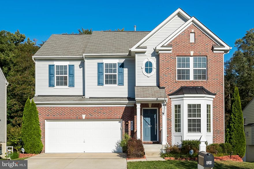 Welcome to 631 Old Waugh Chapel Road in Odenton.  This Alison model offers a spacious, relaxing environment in which to enjoy comfortable living.  This vinyl and brick home features 5 bdrms & 3.5 baths. You ll appreciate the following features: formal living room with hdwd floor and bay window; half bath with hdwd floor and pedestal sink; gourmet kitchen with stainless-steel appliances, GE smart refrigerator and double wall ovens, gas cooktop, built-in microwave, cherry cabinets, work island, granite countertops, 2 deep sinks with no-hands faucet, dishwasher & disposal, walk-in pantry, 18  ceramic tile floor and desk area; kitchen opens to the dining area and relaxing family room offering a propane gas fireplace with adjustable thermostat; the upper level beckons you to enjoy 4 generous bedrooms including the expansive master bedroom with shutters and loads of natural light plus walk-in closet; relax in the owner s bath soaking tub where you ll appreciate the double sinks with marble counter, separate shower and tile flooring; this level also has a wonderful hall bath with double sinks that will serve the family well; also on this level is a commodious, open loft with a large window and closet   super space for a TV area, office/den or extra space for overnight company; if you need more space, check out the fully-finished basement with a bedroom and full bathroom w/granite counter and tile flooring; plus you re sure to appreciate the rec room/media room there with surround sound speakers and bookcases; from here you can access the verdant backyard with its stone-paver patio and built-in stainless-steel gas outdoor grill; from the home s main level, walk  out onto your expansive, low-maintenance deck which is also great for entertaining or just having quiet time enjoying the wooded view; from the deck you ll love the access to the patio afforded by the low-maintenance stairway.  This home also has an attached, 2-car garage w/remotes, full hard-wired alarm system, CAT 5E network cabling and telephone hookups in all rooms, plus front-load computer-sync d steam washer & dryer and ceiling fans   what else could you ask for?  Welcome home!  See Agent Remarks for front-foot fee.