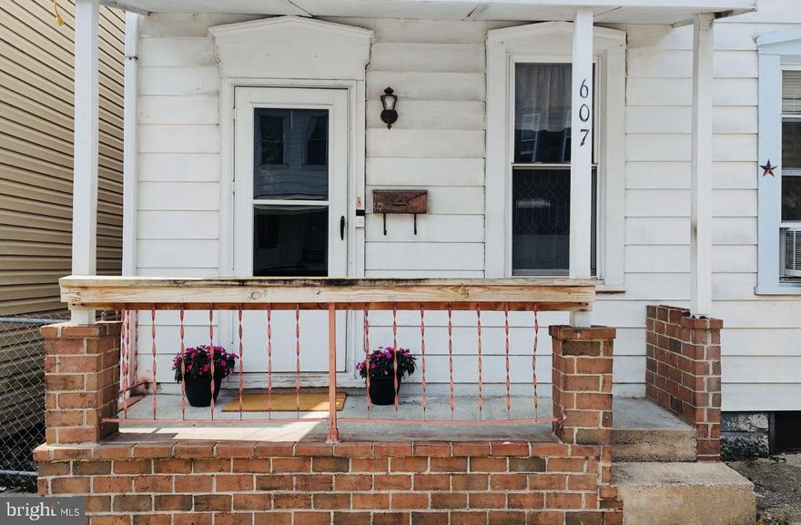 *MOTIVATED SELLER. JUST REDUCED*…adorable move in ready duplex waiting for your personal touch.   3-bedroom, 1 bath with plenty of room to grow. 2 bedrooms on the second floor plus a large main bedroom in the finished attic space.  Don’t miss the amazing fenced back yard with a large deck and beautiful garden pavers. Fence opens to a private parking pad!!!
Main level has an easy open feel. Large open kitchen and the mudroom with main level laundry off the kitchen offers extra storage space.  The charming front porch and original hardwood floors finish off the space.