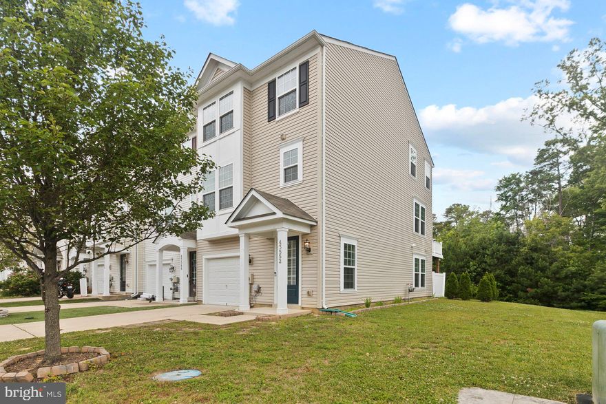 Beautiful end unit Townhome in Magnolia Park.  Tons of natural light with the side windows gives it a bright and welcoming feeling!  This townhome features 4 bedrooms and 3 and a half bathrooms including a bedroom and full bath on the first floor!  Working from home?  No problem Verizon Fios is available here!!  Upgrades include beautiful hardwood floors, granite counters, SS appliances, recessed lighting, maintenance free deck out back.  This home has been freshly painted and ready for its new owners to move right in!  Enjoy the community pool during the hot summer days!  Perfect location convenient to shopping, schools, food and a short commute to PAX River NAS.  Schedule your showing today, don't miss out!!!