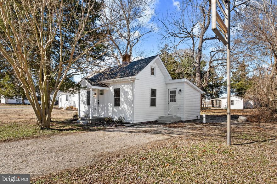 Who wants to live on the river without all the headaches? Nestled along the serene banks of the Wicomico River, this charming cottage-style home offers a unique blend of modern luxury and timeless comfort. With a top to bottom renovation completed in 2025, every corner of this residence has been thoughtfully designed to enhance your living experience. Step inside to discover a beautifully appointed interior featuring luxury vinyl plank flooring that exudes warmth and sophistication. The open layout seamlessly connects the living spaces, creating an inviting atmosphere perfect for both relaxation and entertaining. The heart of the home kitchen is equipped with high-end appliances including a built-in range and a single oven, ensuring that culinary adventures are always within reach. This charming one-bedroom, one-bathroom retreat is ideal for those seeking a peaceful escape.  Outside, the property boasts a generous 0.2-acre lot, where you can enjoy the soothing sounds of nature and the gentle flow of the river. Views of the Wicomico River create a serene backdrop, inviting you to spend leisurely afternoons by the water's edge or to indulge in outdoor activities. With water access at your fingertips, you can explore the river's beauty, whether it's for kayaking, fishing, or simply enjoying the scenic views. The exterior of the home reflects a classic cottage aesthetic, harmonizing beautifully with its natural surroundings. The driveway provides convenient parking, ensuring that your guests feel welcomed and at ease. This property is not just a home; it's a lifestyle. Experience the tranquility of riverside living while being just moments away from local amenities and recreational opportunities. Whether you're sipping your morning coffee or hosting a gathering with friends, this residence offers a perfect blend of luxury and comfort, making it an ideal sanctuary for those who appreciate the finer things in life. Embrace the exclusive lifestyle that this remarkable property has to offer, where every day feels like a retreat.