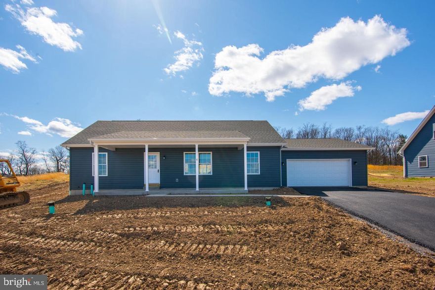 Spacious ranch-style home on an open 0.47-acre lot with scenic views of Blue Mountain—just 2 miles from Swatara State Park and offering convenient access to both I-81 and I-78. This thoughtfully designed rancher features a stunning kitchen with granite countertops and a spacious dining area perfect for gatherings and entertaining. The layout flows seamlessly into a bright and airy living space with cathedral ceilings and beautiful views.

The private primary suite offers a relaxing retreat with an en-suite bath and a generous 11x6 walk-in closet, while the opposite side of the home includes two additional bedrooms (or a home office), a full bathroom, and a convenient mud/laundry room. Additional highlights include a full basement, oversized two-car garage, and inviting outdoor spaces with a covered front porch and rear patio—perfect for enjoying the surrounding scenery.

Building has not yet begun, so there is still time to pick styles and colors! Photos are of the same ranch home in a different location.

Prefer something different? No problem! Act now to choose from various home styles starting at 800 square feet, with or without a basement or garage. Whether you’re drawn to a one-story ranch, a two-story, a bi-level, a Cape Cod, or another layout entirely, Hennick Construction has a floor plan to match your vision. Once permits and contracts are finalized, you could be moving in within just four months!