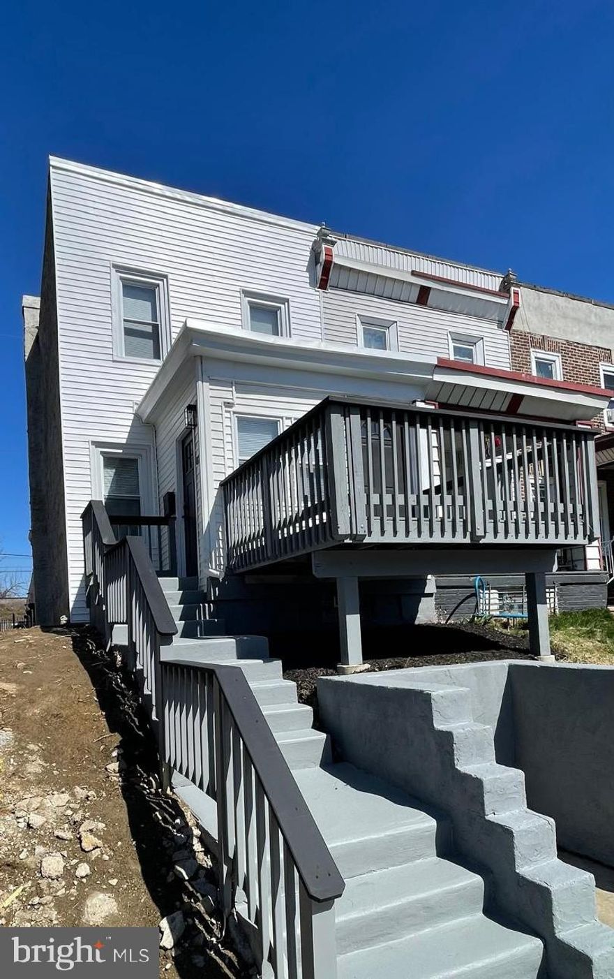 Discover Your Dream Home on Fisher Ave! Introducing absolutely STUNNING 827 W Fisher Ave, a tastefully finished spacious 3BD/1.5BA End-Row with private 2 car-driveway, tons of character and modern upgrades. From exterior to interior, there was nothing left behind. Enter through a tiled hall with exterior door on one side leading to a large front deck and interior door on the other side leading to the main level Open-concept first floor flooded with LED lights, gorgeous floors, light fixtures, window blinds, etc. Preparing meals will be a snap in this brand new kitchen with alpine white cabinets, modern appliances, backsplash tile, ultra-slick matching sink, side island providing extra storage and exterior door off kitchen leading to private balcony which would be perfect for a morning coffee.  CENTRAL A/C & HEAT, keyless entry door lock system, recessed LED lighting and so much more. First floor powder room for convenience. Upstairs you will find 3 good size bedrooms with plenty of closets. Each bedroom closet comes with organizing shelve. Full bathroom with the tub, modern sink, Mirror with light and all towel & toilet hardware already built in and matching faucets & shower head. Huge front to back basement would make a great addition for a storage or workspace offering plenty of LED lighting, washer and dryer hook ups and rear entry door leading to your own private and fenced 2 car driveway. Easy access to local transportation as well as restaurants, cafes, bars and retail. Enjoy the living with asy access to some of the region’s best outdoor areas including the Wissahickon Valley Park, Cresheim Valley and much more. Just minutes away from R1. Schedule your private showing today.