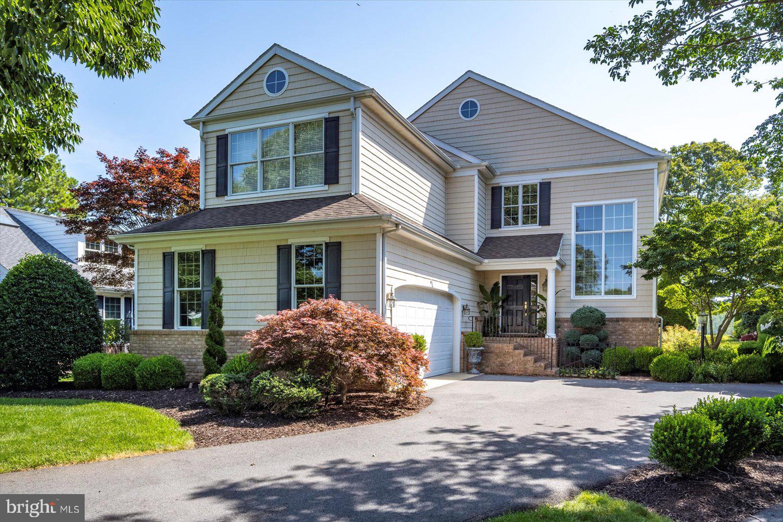 Nestled in the gated riverfront community of Cherry Hill and minutes from Tidal Health, Salisbury University, and Downtown Salisbury, this stately 3991 SF, 4 bedroom, 3.5 bath residence offers an inviting floor plan with an emphasis on relaxed living and entertaining. Tranquil water views enhance the spacious home featuring hardwood flooring in all 1st floor rooms. an open staircase, hardwood 2nd floor hallway, relaxing primary suite w/ gas fireplace, tray ceiling, and hardwood floors, as well as 3 additional bedrooms and a bonus room with new neutral carpet. The hub of the home is the gourmet kitchen offering a 6-burner gas range, walk-in pantry, large work island, separate breakfast bar, casual dining area, and is open to the window-filled great room w/ gas fireplace and patio access. Other 1st floor gathering spots include the formal dining room and flex space w/ built-in bar and patio access. Enjoy viewing the creek, river and wildlife from the back yard and inviting patios. Take a stroll to the community waterfront area w/ picnic table, casual seating, and bulkhead for temporary boat tie up. Quarterly condo fee includes lawn care, in ground irrigation, septic, trash pick-up, entrance gate maintenance, road maintenance, and snow removal. UPDATES INCLUDE: 1ST AND 2ND FLOOR HEAT PUMPS (8/2024), GENERAC WHOLE HOUSE GENERATOR (2023).