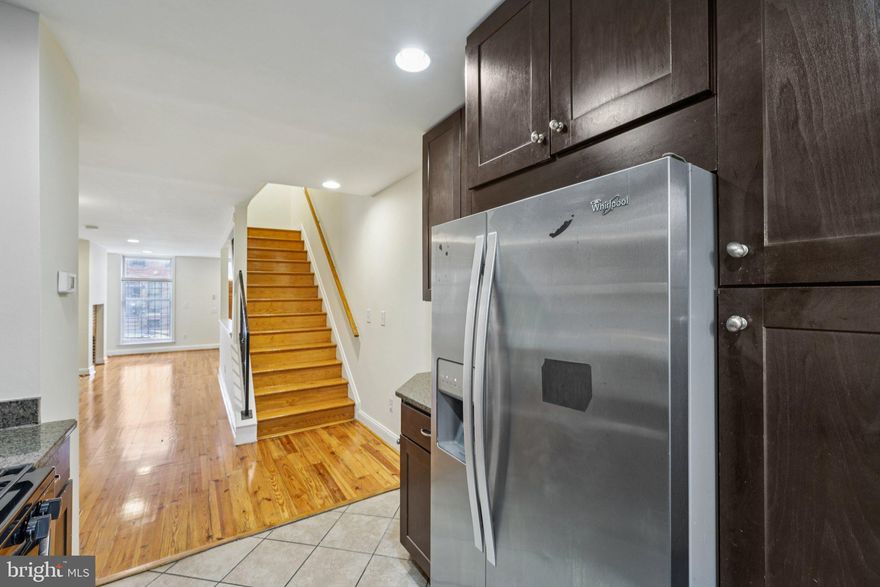 There are levels to this---literally.  This 4 level  townhome has charm, exposed brick, and a convenient location.  3 bedrooms and 3 full bathrooms!  Basement with a full bathroom.  Granite countertops and Hardwood floors throughout!  Convenient to the Port of Baltimore (Inner Harbor), Johns Hopkins University, Coppin State University, and University of Maryland (Baltimore)!  Minutes to M & T Stadium and Oriole Park!  Minutes to the MARC train and public transportation.  Location and convenience set this home apart!