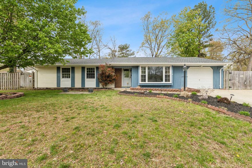 Well-loved and thoughtfully maintained, this 3-bedroom, 2-bath rambler sits on a beautifully landscaped corner lot on a quiet street. The functional layout offers a spacious living room with a large bay window that fills the space with natural light. The kitchen and dining area combo features an abundance of cabinetry, a gas range, and a large stainless steel fridge, perfect for everyday living. A freestanding wood pellet stove adds charm and comfort. Recent updates include brand new carpet throughout, fresh paint throughout, new LVP flooring in both bathrooms, several new ceiling fans and light fixtures, new water heater in 2019, and new HVAC system in 2023. The fully fenced backyard is level and private, complete with a brick patio ideal for relaxing or entertaining. The attached one-car garage includes built-in shelving to meet your storage needs. This home has been cared for with pride over the years, come check it out for yourself, schedule a tour today!