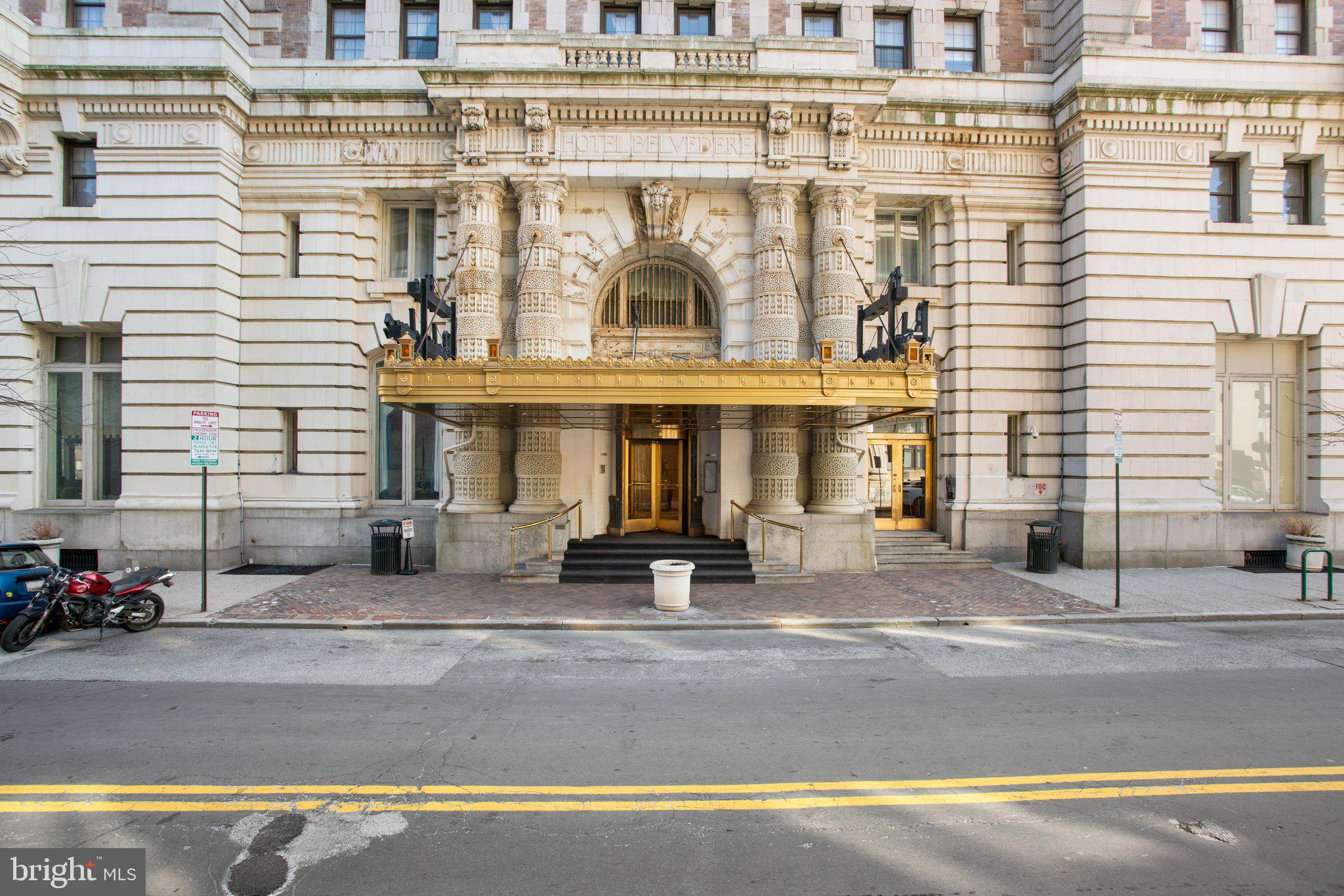 Move-in ready 1 BR/1 BA in desirable Mount Vernon. This condo is located in the historic Belvedere Hotel, featuring 24-hour Concierge service, impressive marbled lobby and the storied Owl Bar restaurant.
A private, gilded resident elevator takes you to this third floor gem which boasts a soft color palette, crown molding, high ceilings, unique tiled floors and large light-filled windows.
The full bath features marble walls, built in shelving, walk-in tiled shower with both an overhead and a wall mounted spray unit.
The galley kitchen offers IKEA cabinets, granite counters, recessed lighting and a passthru into the main living space. The open floor plan highlights a stunning original (non-working) fireplace with granite hearth and mantel, spacious living room and sizable bedroom with large adjacent closet. Two shared laundry rooms, a trash room and oversized service elevators are all conveniently located within steps of the homes' front door.
This mid-town neighborhood is friendly, vibrant and an easy walk to restaurants, nightlife, parks, museums, shops and stadiums. Spring flower shows, holiday festivals, fireworks, concerts and community events add to the charm of living in this remarkable Mount Vernon home! Book your showing today!