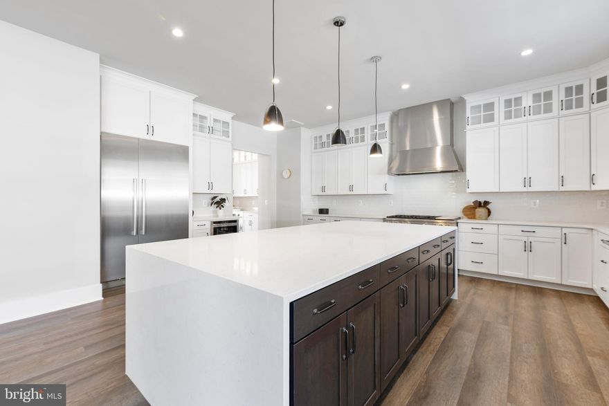 Nestled on a Quiet Cul-de-Sac in Rivercrest!
Completed in 2023, this 6BR/6.5BA home blends timeless design with modern amenities in one of Arlington’s most sought-after neighborhoods. Offering rare main-level living with soaring ceilings, a bedroom, and dual offices, the home is designed for both flexibility and long-term accessibility. An elevator to all levels ensures convenience for every stage of life.

The gourmet kitchen is a showstopper featuring a waterfall island, walk-in pantry, butler’s pantry and bar area. The main level also includes a formal dining room, breakfast area and expansive light-filled living spaces. Upstairs, the luxurious primary suite boasts two walk-in closets (one with direct laundry access), a coffee/wet bar and a spa-like bath. All secondary bedrooms feature en-suite baths and generous closets.

The finished lower level offers a media/game room, bedroom, full bath and ample storage. Outdoor living is enhanced by mature trees, a shaded low-maintenance deck and a private backyard.

Car enthusiasts will appreciate the 3-car garage with coated flooring, lift-ready for up to 6 vehicles.

Located just minutes to GW Parkway, Chain Bridge, Tysons, and DC, with access to Jamestown ES, Williamsburg MS, and Yorktown HS (all 9/10 rated schools).

A rare opportunity to own a spacious home in Rivercrest.

*Note: Select images have been AI-enhanced for illustrative purposes and may not reflect current property condition. AI images are noted.