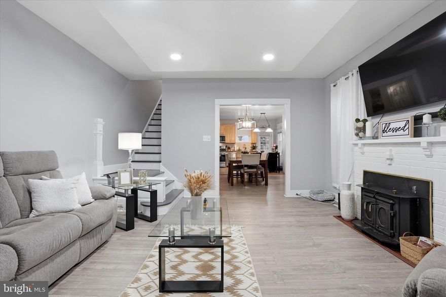 Welcome Home to 7032 Erdrick St — Comfort, Space, and a Little Something Extra

Some homes just check the boxes. This one checks them all and then throws in a hot tub.
The open layout connecting the kitchen, dining, and living areas makes everyday living feel easy and natural, whether you're cooking, entertaining, or simply enjoying the space. The kitchen itself features warm wood cabinetry, a tile backsplash, and a full suite of stainless steel appliances including a gas range, built-in microwave, dishwasher, and a French door refrigerator with ice and water, all recently purchased and still under warranty. Three well sized bedrooms offer plenty of room for everyone, including a generous primary suite with two closets, because one is never really enough.

The renovated bathroom comes with a built-in Bluetooth speaker right in the lighting, because your morning playlist deserves better acoustics than your phone on the sink. A tankless water heater ensures a never ending supply of hot water, and it's still under warranty for added peace of mind.
Head downstairs to a partially finished basement that's full of potential, with additional living space, a half bath, and a dedicated laundry and storage area. There's also a guest half bath on the first floor, because good hosting is in the details.

Out front, the enclosed porch is your new favorite room, quiet enough to focus, cozy enough to unwind, and perfect for a work from home setup that doesn't feel like a closet. Out back, a covered porch and a hot tub under a pergola are waiting to become your personal after-work ritual. You've earned it.

Conveniently located near ShopRite, Save A Lot, PNC Bank, Citizens Bank, Walgreens, restaurants, a gym, and the shops and businesses of the Mayfair corridor, everything you need is just around the corner.

Qualified buyers may also be eligible for grant programs offering around $15,000 toward homeownership. A great home and a financial boost to get you started, not a bad deal.