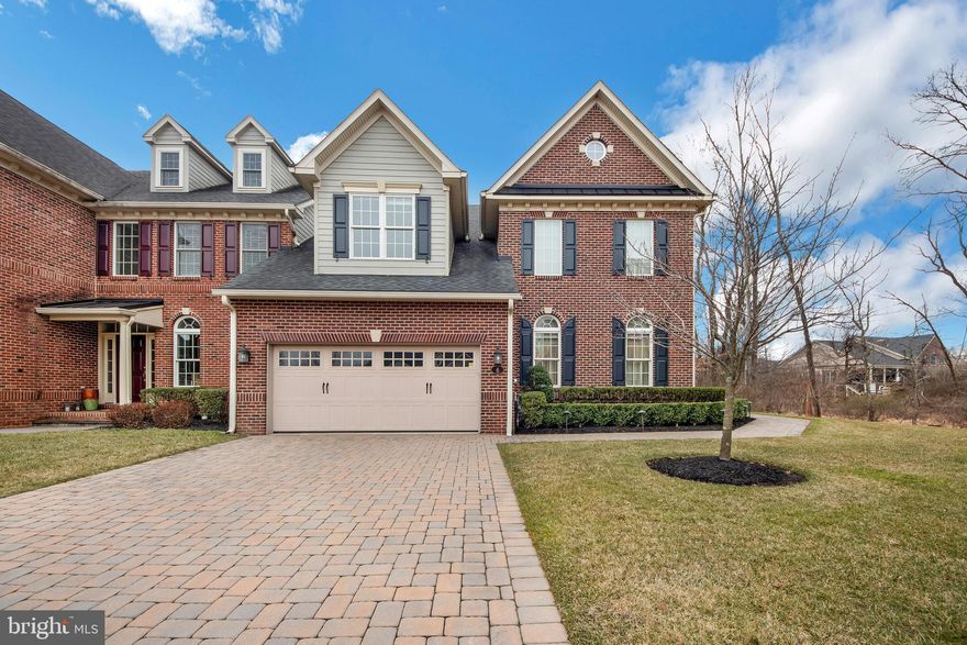 Welcome to Delancey Court, one of the premier 55+ Active Adult communities in the Bucks County area. The communities architectural style mimics the historic Philadelphia Neighborhoods featuring cobblestone driveways and brick exteriors. This end unit carriage home is upgraded throughout! The custom paver driveway and walkway lead to the covered porch and side entry to this magnificent home. The two plus story formal living room provides a dramatic entry and features hardwood flooring, and large windows. The sunlit 2-story formal living room includes custom wainscot, crown and chair moldings, 6’ baseboards, recessed lighting and a turned staircase that leads to the Upper Level. The formal dining room includes  custom crown molding inset, wainscot with chair rail that is open to the kitchen and family room areas.  The gourmet kitchen boasts cathedral ceilings, large window seat with storage, granite counters, designer tile backsplash, recess lighting, all  upgraded stainless-steel appliances including a wall oven and microwave, a 5-burner gas cooktop with custom vented hood, dishwasher and an extra-large island with granite counters. The expansive island features additional double-sided cabinets and drawers for extra storage and opens to the adjacent 2-story sun drenched large Family Room with gas fireplace, recess lighting, large windows and remote controlled window shades is exquisite living space. The adjoining breakfast room features high ceilings, a glass door which accesses the expansive paver patio, custom retaining wall with professional plantings and fenced backyard and is a great place to relax or entertain. Outside the fenced area is an open yard with  planted evergreens for additional privacy. First floor owner's suite complete with wood built in cabinets,  1 large walk-in closet with 1 additional closet,  tray ceiling, recess lighting and custom moldings that are polished and sophisticated. The luxurious bathroom complete with soaking tub, large walk in shower, granite countertops, double vanity and crystal light fixture is gorgeous! A Powder Room, laundry room and large walk-in closet complete the main level of this beautifully appointed home. The grand circular staircase leads to the second level which features a spacious area with  balcony overlooking the 2 story family room. Two additional spacious bedrooms, a hall bath with dual vanity, and a large storage closet complete the Upper Level. A staircase leads to the 3rd Level loft area which features large room with built-in storage cabinets and upgraded carpet is great additional space. Other amenities include custom made drapery, a security system, whole house generator, central vacuum system, custom window blinds, 2 car oversized garage, multi-zone HVAC, ,smart house technology, extensive landscaping and much more! This home was designed for maximum comfort and luxury with minimal maintenance. Within close proximity to historic Newtown Boro with its shopping and dining, easy access to I-95 and the Pa & NJ turnpikes, this location makes traveling to Philadelphia, Princeton, New York and the New Jersey Shore an easy commute. The Delancey Court community features a private clubhouse, fitness center, indoor and outdoor pools, bocce court, conference room, game room and great room with a catering kitchen. Welcome home to Delancey Court.