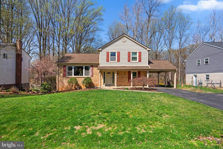 The perfect combination of a stunning tree-lined view and updates galore! This is one of our favorite models, and it has all the spread-out space you could imagine! When you come inside, there is a small staircase to the left that will take you "upstairs" to the living room, dining room, and kitchen. On the main level, there is a bedroom, den, family room, and a beautifully updated full bathroom! When you're in the kitchen, you may be distracted by the absolutely gorgeous view out the back bay window, but try not to miss the recently renovated kitchen with timeless finishes. Upstairs, you have three additional bedrooms and two full bathrooms! The basement bonus area is perfect for anything you desire! The storage/utility room walks out to the back yard. The cherry on top of this incredible home is definitely the view of the never-to-be-developed conservation area! You feel like you are miles outside of town while being tucked in the back of a quiet neighborhood and a no-through street. Call us for your private showing today!