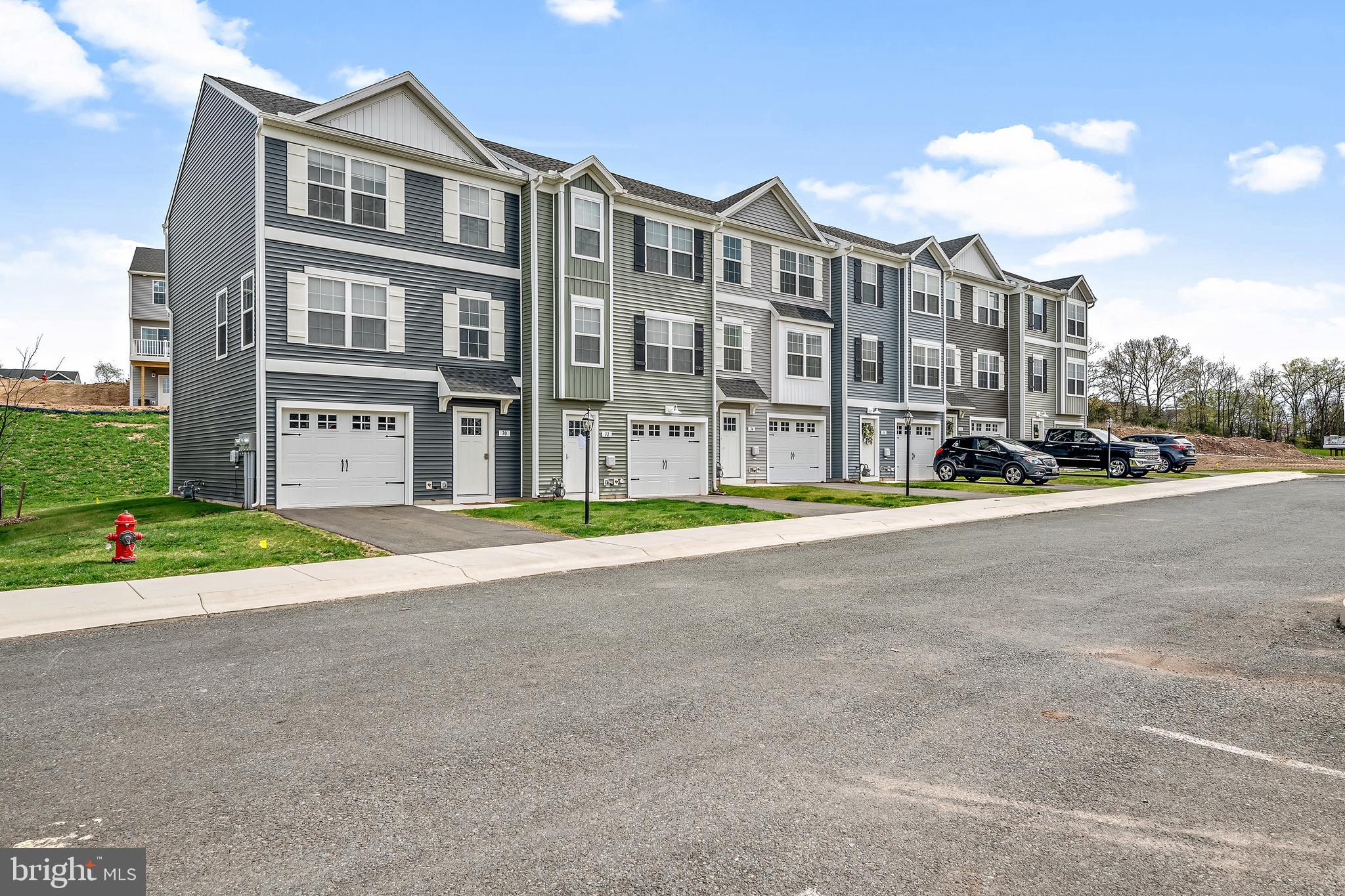 Move right into your brand-new luxury townhome in our modern rental community, Quinn Station! These thoughtfully designed townhomes in Chambersburg, PA, are ideally located near Nicholson Square Park, Wilson College, and major commuter routes like Highway 11, Highway 30, and Interstate 81, making it easy to access everything you need.

The spacious 3- and 4-bedroom homes feature open layouts perfect for modern living, with stylish wood-style flooring throughout the main areas and plush carpeting in the bedrooms for added comfort. The kitchens are equipped with stainless steel appliances, granite countertops, and sleek finishes, offering both functionality and style. Each home also includes a private garage and deck for your convenience.

Beyond the comfort of your home, you'll find shopping, dining, and entertainment options just a short drive away. Enjoy the convenience of being close to top employers like GDC IT Solutions and WellSpan Chambersburg Hospital, as well as local attractions. Whether you're commuting, relaxing at home, or exploring the community, these new townhomes offer everything you need for a comfortable lifestyle.

Call today to schedule your private showing and secure your lease in this sought-after location! Model home pictures.