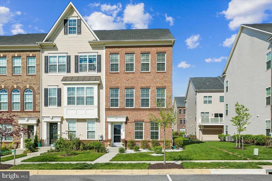 Welcome to this light-filled, beautifully appointed 3-bedroom, 3.5-bath semi-detached townhome nestled in the sought-after Brickyard community of Beltsville. Thoughtfully designed for modern living, this home features hardwood floors, central air conditioning, an abundance of natural light, and so much more.

The entry level offers a comfortable bedroom with a private ensuite — ideal as a guest suite or home office. Head up to the main level where a spacious living room invites you to relax and entertain, with direct access to a private balcony perfect for morning coffee or evening unwinding.

The open kitchen is a chef's delight, showcasing stunning countertops, stainless steel appliances, and an abundance of cabinet space — a perfect blend of style and function.

Upstairs, the spacious primary suite is a true retreat, complete with a generous walk-in closet and a luxurious ensuite bath featuring a double vanity and a separate shower. An additional bright and airy bedroom with a spacious closet rounds out the upper level, along with the added convenience of upper-level laundry.
A rear-entry 2-car garage completes this thoughtfully designed home. Ideally located near retail shopping, parks, and major interstate access  commuting and weekend errands have never been easier. A rare opportunity to own in one of Beltsville's most desirable communities.
