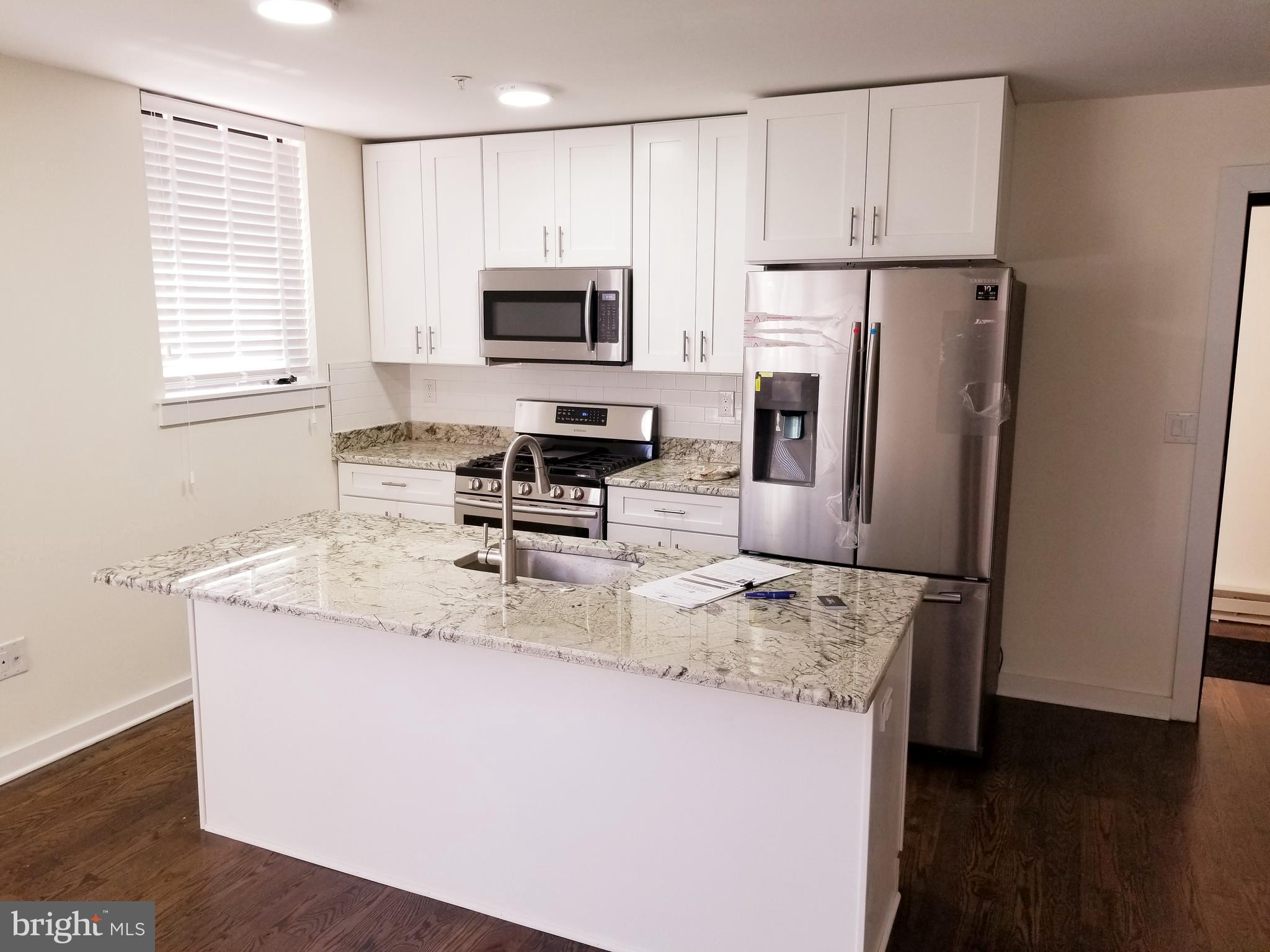 A premium location in Society Hill for spectacular rentals in this six unit, boutique building. Full size elevator service to all floors. Samsung appliances; site finished, hardwood floors; stone counters; custom window treatments; glass shower doors; soaking tubs; washer/dryer in each unit. Walkscore calls this location Paradise with a score of 99. The perfect location to enjoy all that Center City has to offer. Ground floor unit at street level, very convenient easy access. Plenty of closet space plus storage in the basement. This is a specious two bed, two bath unit with southern exposure. Perfect floor plan for co-living. Sorry no pets.