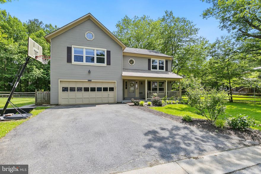 Welcome to this lovely 4-bedroom Colonial with 2 full and 2 half baths, offering over 3,000 finished square feet of living space on a generous 12,996 square foot fenced and gated lot in the highly sought-after Olney Oaks community. Nestled on a quiet street, this spacious home blends timeless charm with thoughtful updates throughout. A freshly painted front porch welcomes you into a light-filled interior featuring newly painted rooms, gleaming refinished hardwood floors on the main level, and brand new carpet on the upper-level stairway, hall, and all bedrooms. The kitchen boasts granite countertops, stainless steel appliances, and hardwood flooring, opening into a warm and inviting family room with a wood-burning brick fireplace with a brand new liner, a box window dining nook, and French-style doors that lead to the expansive backyard deck. A spiral staircase connects the family room to an upper-level office with cathedral ceilings and brand new carpet. The main level also includes a formal dining room with crown and chair rail moldings, a bright living room with crown molding, and a stylish powder room with a granite vanity and hardwood flooring. Upstairs, in addition to the aforementioned office, the spacious primary suite features cathedral ceilings, brand new carpet, ceiling fan, and twin walk-in closets, one with attic access. The ensuite bathroom includes a stall shower, granite vanity, ceramic tile flooring, a separate tub with updated tile surround, and an additional granite vanity in a separate room. The upper level also includes a linen closet, a fully updated hall bathroom with ceramic tile flooring and a tub/shower combination with tile surround,The laundry area is conveniently located on the upper level and features a brand new washing machine. The finished basement provides additional living and entertaining space, complete with a freshly painted recreation room featuring a built-in TV area and shelving, a half bathroom with pedestal sink and pocket door, and a large storage and utility room. Outside, the private backyard offers a large wooden deck, a fire pit area, a split rail fence with three gates, and a spacious shed equipped with electricity—ideal for storage or use as a workshop. Additional home improvements include updated double-pane windows, an updated roof, a newer HVAC system (3 years), an updated 80-gallon hot water heater, alarm system, six-panel doors, and detailed trim work with crown and chair rail moldings throughout. This turn-key property offers exceptional space, comfort, and character in one of Olney’s most desirable neighborhoods.