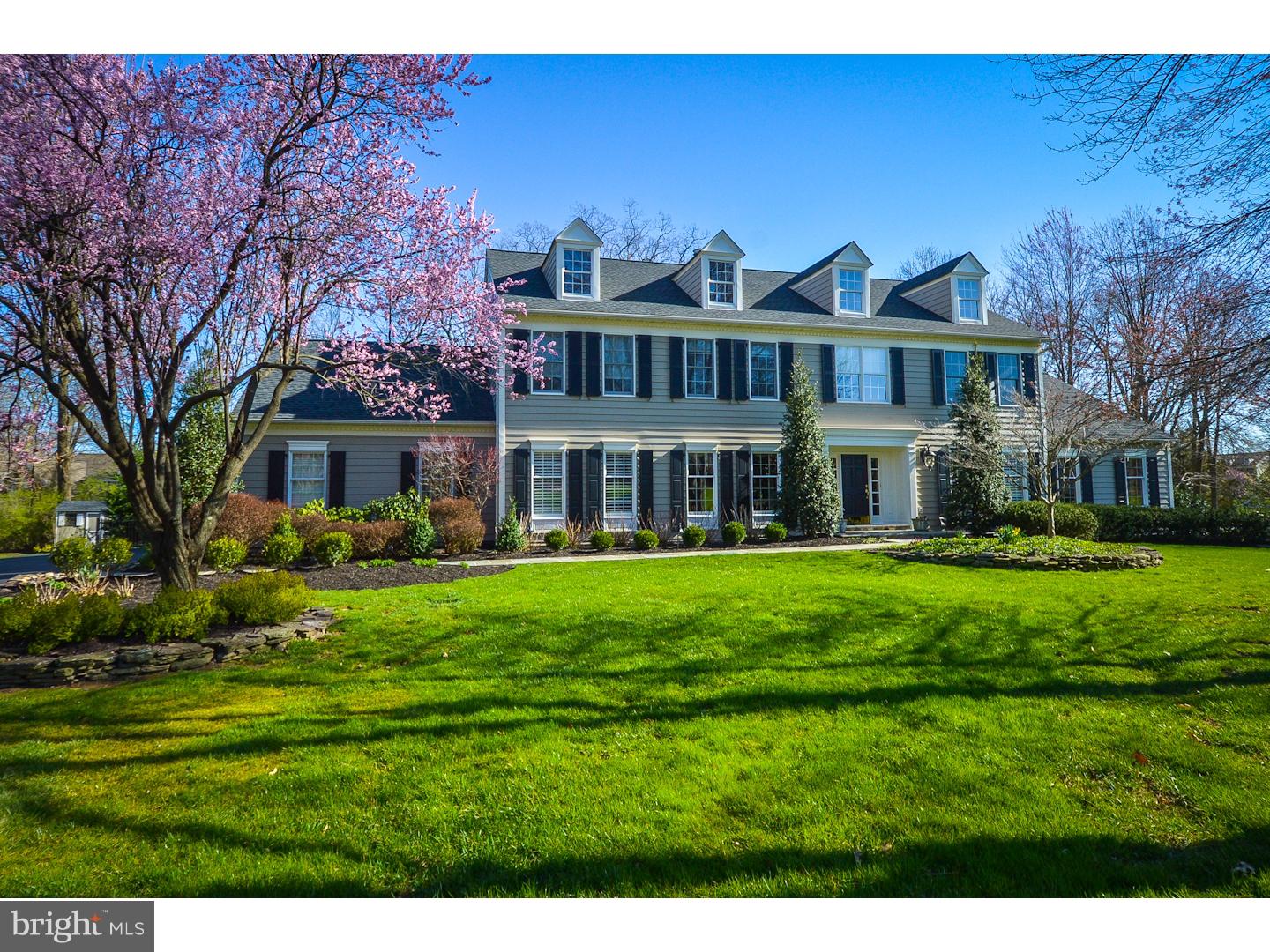A magnificent Entertainment home!!! This beautiful two-story colonial covers 6,000 square feet of wonderful living space which has a distinctive new entrance way, with handsome peaked dormers along the new roof line, as well as maintenance free siding. An elegant foyer with classic staircase is the center pathway for the formal living and dining rooms which are designed with classic moldings. Proceeding on into the gallery hallway to the rear of the home is a family room with brick fireplace, wet bar for entertaining convenience and French doors opening to a rear sunken deck. An "Elite" wing with a media room with floor to ceiling windowed wall and see-thru gas fireplace, and an additional relaxation room adjoins the family room. Also to the rear,passing the updated powder room is a spacious designer kitchen with modern cabinetry, Granite counters and Thermador appliances,a new Bosch dishwasher and microwave and is equipped with all of the latest cooking appliances and amenities ready for your culinary pleasures. A sun drenched breakfast room with cathedral ceilings and French doors to a multi level cedar deck accented by a Palladian window accentuates the kitchen. There is an office, mud room and laundry room with a side entrance to the three-car garage( which has been altered to accommodate the mud room). A large master bedroom with a magnificent sun-filled master bath, sitting area as well as a huge walk-in closet. The second floor also provides three additional generous bedrooms sharing a new totally renovated full bath. The finished basement has wonderful living space, including a fully-equipped theater area, pool table, comfortable sitting area, a craft area as well as a separate bedroom and bath. The back yard is like an Oasis with private patio areas and the large re-plastered pool(2009)with the jacuzzi and Pergola areas accenting the look. This lot backs to a wooded area adding to the appeal.
