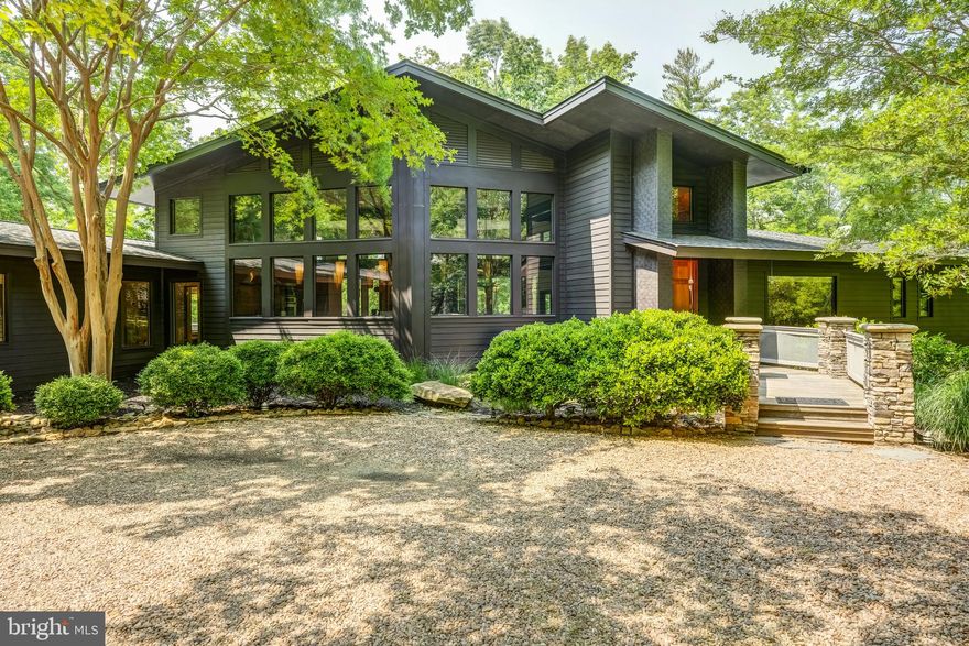 Introducing this extraordinary architectural gem situated on picturesque Carter's Creek in Irvington, VA. This stunning residence, designed by architect Randall Kipp, exudes contemporary elegance and offers a truly unparalleled living experience. As you step inside, you'll be immediately captivated by the soaring 17-foot ceilings that create a sense of casual elegance and allow natural light to flood the space. The expansive glass windows offer breathtaking panoramic views of the waterfront complete with pier and boat lift, seamlessly blending the indoor and outdoor spaces. Note the meticulous craftsmanship and attention to detail evident throughout the home. From the exquisite interior casework to the magnificent stone work, every element has been carefully selected to create an ambiance of luxury and refinement. The open-concept floor plan effortlessly combines the main living areas, including a spacious living room, a gourmet kitchen equipped with top-of-the-line appliances, and a dining area perfect for hosting unforgettable gatherings. Retreat to the serene owner suite, complete with a spa-like ensuite bathroom, home office/gym and private access to the outdoor deck & screen porch where you can relax & admire the tranquil waterfront setting. Two additional bedrooms provide ample space for guests. This home offers a lifestyle of sophistication & tranquility. Whether you're enjoying sunsets at home or exploring the charming town of Irvington, this remarkable residence provides an unparalleled opportunity to indulge in waterfront living at its finest.