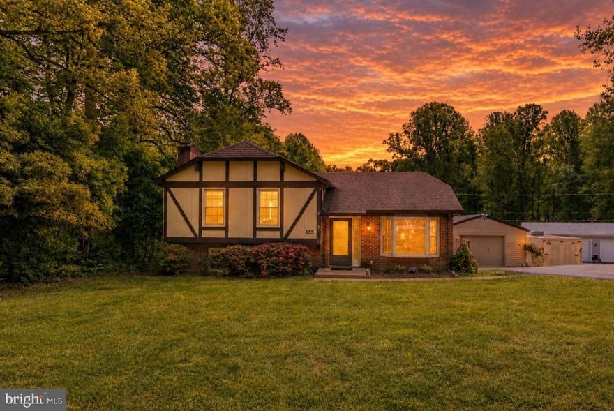 Full of charm and character, this 3-bedroom, 2.5-bath bi-level home offers an ideal blend of comfort, functionality, and location — all with no HOA. A beautiful custom front door welcomes you into the light-filled family room, where a large bay window and gleaming hardwood floors create a warm and inviting atmosphere. The hardwood floors continue into the spacious eat-in kitchen, offering plenty of room for both everyday living and entertaining. Upstairs, all three bedrooms are thoughtfully situated on the same level, along with a full hall bath. The primary suite serves as a private retreat, featuring an ensuite bath with a newly renovated shower. The lower level expands the home’s living space with a versatile recreation or secondary family room featuring walk-out access to the backyard. This room is anchored by a stunning gas brick fireplace that can be restored to wood burning if you so choose. The laundry area completes the lower level. Step outside to enjoy the peaceful surroundings from the deck overlooking the spacious backyard. The property also includes a detached one-car garage for added convenience. Perfectly positioned just minutes from shopping and dining along Rt. 17, I-95 commuting, commuter lots, and downtown Fredericksburg, this home offers the convenience of location paired with timeless appeal.