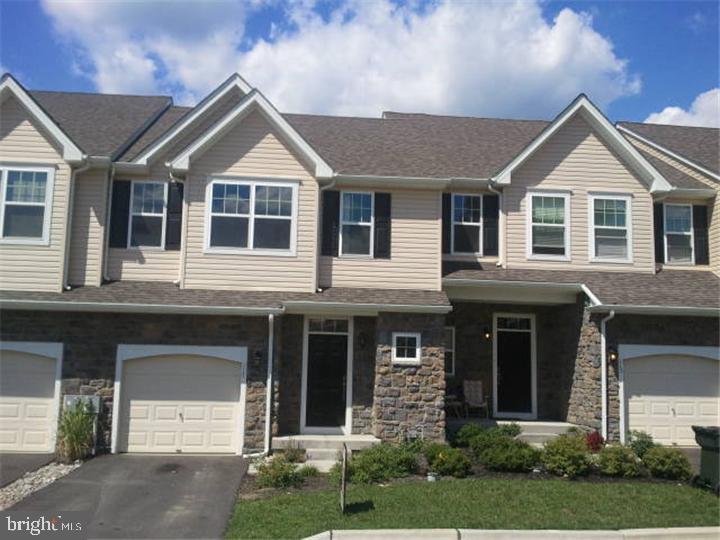 Great Townhouse for Rent! This home features 3 bedrooms, 1.5 baths and a storage foundation. The foyer and center hall feature beautiful hardwood flooring leading to the great room and spacious kitchen. Upstairs you will find a generous master suite with a large walk-in closet and two additional bedrooms, a hall bath and laundry area. Included is a 1 car garage, plus additional off-street parking nearby. Carillon is a unique community of affordable housing that features a Clubhouse and pool. Tenant responsible for $125/MO HOA Fee. No pets - No Smoking. Credit check required ($34/Adult over 18). First month and security deposit due at lease signing.