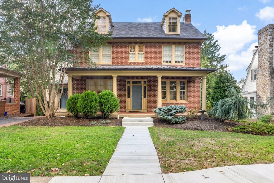 Timeless character meets extraordinary craftsmanship in this meticulously renovated historic Baker Park home. Originally built circa 1937, this residence has been thoughtfully reimagined to honor its architectural heritage while delivering every modern comfort today’s buyers expect. The renovation was a true labor of love—preserving original details wherever possible while upgrading systems, flow, and function for effortless everyday living and entertaining. Original hardwood floors, restored doors with glass knobs, lath-and-plaster walls, a fully restored fireplace, and iconic cast iron radiators anchor the home in its historic roots, while seamless additions and smart design elevate it for contemporary life.
At the heart of the home is a spectacular open-concept kitchen and dining space, created through a rear addition that blends beautifully with the original structure. Designed for serious cooks and memorable gatherings, the kitchen features professional-grade appliances, custom cabinetry, handcrafted Italian tile, and a rare indoor Italian wood-fired brick oven—an unforgettable focal point perfect for year-round entertaining. The home’s layout has been reworked with intention and care. The main level offers a welcoming flow with a dedicated home office, a stylish powder room, a mudroom / and large workspace or second office; and a main-floor laundry complete with a traditional laundry chute. Upstairs, the primary suite is a true retreat with a reconfigured spa-like bath and expansive walk-in closets, while secondary bedrooms retain their classic charm. A covered upper-level deck—preserved and rebuilt—offers a peaceful spot for morning coffee or evening wine with mountain views. Upstairs the attic space features an exceptional and delightful guest room!  With ample area to relax after a day of sightseeing; a full bathroom and spacious sleeping area it truly is a visitors' delight! The fully finished lower level provides exceptional bonus space, including a recreation room, home gym, gear and storage rooms, and a temperature-controlled wine cellar designed to hold over 1,000 bottles of your special wine. A very sweet reading nook provides a cozy reading space! Major system upgrades include a fully replaced electrical and plumbing infrastructure, modern multi-zone climate control with smart thermostats, heat pumps supplemented by restored cast iron radiators for cozy winter warmth, tankless hot water, upgraded sewer and stormwater systems, and premium windows and siding where appropriate. A unique attached two-and-a-half-car garage—accessed from the rear alley—adds everyday convenience while preserving the home’s classic street presence. The front façade remains beautifully intact, complete with original windows and copper gutters that enhance the timeless curb appeal. Set in one of Frederick’s most beloved neighborhoods, just steps from Baker Park and minutes from downtown shops, dining, and events, this home offers a rare opportunity to own a piece of history—expertly restored, thoughtfully expanded, and ready for its next chapter. Live your bliss...