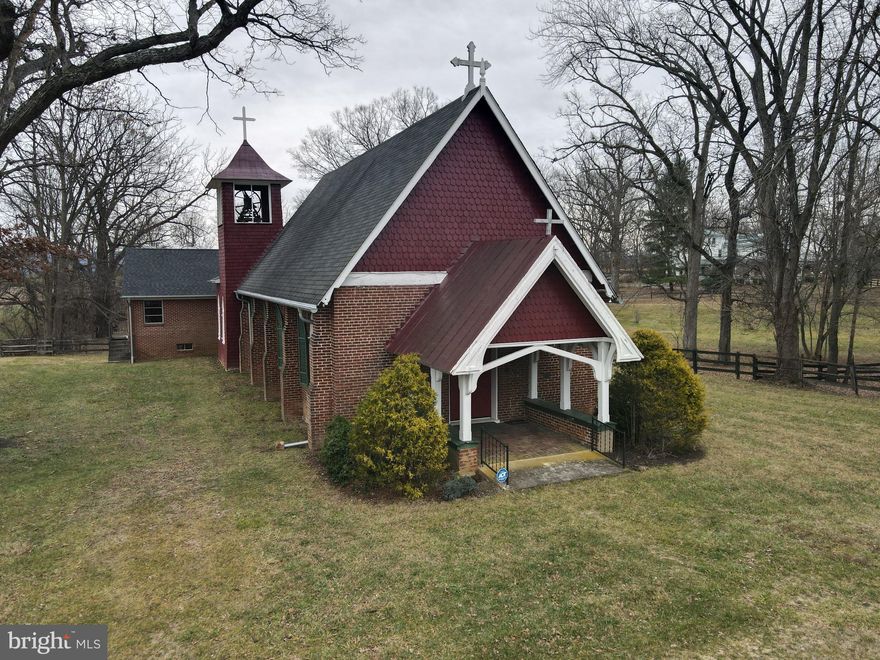Originally a church built in 1875, with additions and renovations as recently as 1966, this building has approximately 3,400sqft previously used as offices, small classrooms, gathering/meeting rooms, and boasts a large open santuary room with vaulted ceilings, perfect for whatever your imagination can come up with. Original stained glass, hard wood throughout, as well as carpet in the newer renovartions. There's an unfinished basement with roughed in plumbing, finish it out however meets your needs. Right on the state maintained Berryville Pike, just 10 minutes from downtown Charles town and 25 minutes from Martinsburg and Winchester.  Deed states it must remain a place of Christian worship.