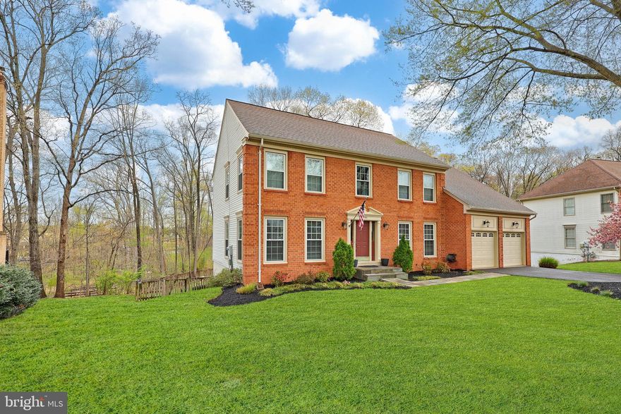 Welcome to the highly sought-after Waverly Crossing neighborhood, where this exceptional 5-bedroom, 4-bathroom colonial home awaits. Offering three levels of expansive living space, a two-car garage, and a serene, private backyard, this home is the perfect blend of comfort and convenience. The main level boasts beautiful LVP and hardwood floors throughout, with an open-concept kitchen featuring generous cabinet and counter space—ideal for preparing meals and hosting gatherings. The kitchen seamlessly flows into the dining room, perfect for entertaining, while the family room provides a cozy retreat to unwind. A private study offers a quiet space for work or reading. A spacious secondary living room, enhanced by a charming brick wood burning fireplace that provides yet another area to relax. A convenient half bath completes this level. Upstairs, you'll find elegant hardwood floors throughout. The expansive primary bedroom is a luxurious retreat, featuring dual closets, an extended sitting area, and a spa-inspired remodeled en-suite bath with dual vanities, a soaking tub, and a separate shower. The upper level also includes three additional generously sized bedrooms and a full bath, offering ample space for family or guests. The fully finished lower level expands your living space with a large recreation room, an additional spacious bedroom, a full bath, and a kitchenette with plentiful storage. From the lower level, step outside into the tranquil backyard, surrounded by mature trees and a multi-level deck—perfect for enjoying the outdoors. The home overlooks a natural conservation area, offering picturesque woodland views. The spacious, fenced yard features three gated entries for easy access. Updates include a new roof (2014), HVAC (2024), hot water heater (2020), windows (2020), new LVP floors in the kitchen and basement (2025), a new composite deck (2023), new basement walk-out French doors (2025), a new fireplace liner (2022), and a new flagstone front porch and walkway. Additional updates include all-new LED lighting, four new toilets, and updated fixtures throughout. Situated in the vibrant Waverly Crossing community, this home offers a wealth of outdoor amenities, including tennis courts, tot lots, pickleball courts, and scenic jogging/walking paths—perfect for active lifestyles. Nature lovers will appreciate the proximity to Flatlick Stream Valley Park and Elleanor C. Lawrence Park for even more recreational opportunities. Commuting is a breeze with easy access to the Dulles Toll Road, Route 28, Route 29, Route 50, the I-66 corridor, and the Fairfax County Parkway. This home is just minutes from Wegmans, Aldi, Costco, Target, Walmart, Fair Lakes Shopping Center, Fair Oaks Mall, Sully Community Center, Cub Run Stream Valley Park, Frying Pan Park, Dulles Expo Center, the Udvar-Hazy Center, and Dulles Airport. Enjoy convenient access to popular dining and shopping in Chantilly and the surrounding Fairfax County area.