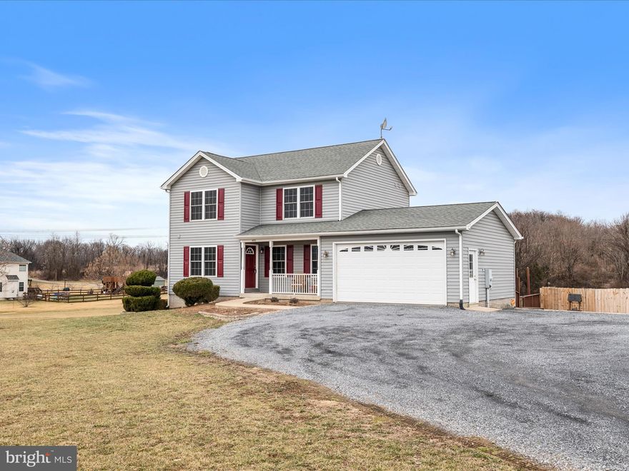 You will adore this immaculately kept colonial on 2 acres with NO HAO... Freshly painted throughout with tons of space in the basement for an extra bedroom/family room.  There is a rough in for a 3 piece bath as well.  Enjoy the mountain views and the peaceful private backyard that is already fenced.  There is zero carpet in this house, it features gleaming  hardwood floors.  Kitchen appliances replaced in 2020, Newer water heater, duel zone HVAC is oversized for this home.  Keep heating bills low with the outdoor wood furnace.