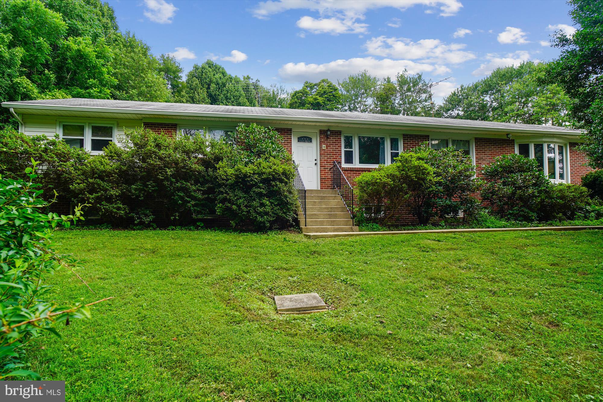 Beautifully maintained and thoughtfully updated with our Fix & List Program, this spacious 3-bedroom, 2-bathroom home sits on nearly an acre in a peaceful Damascus setting. A flexible fourth bedroom could be located on the lower level—ideal as a guest room, home office, or multi-purpose space.
The expanded kitchen offers a fresh, modern feel with freshly painted cabinets, new hardware, a new backsplash, countertops, and sink, plus four added cabinets for extra storage. You'll also appreciate the 2-year-old appliances, including upgraded refrigerator and dishwasher for improved performance.
Additional interior upgrades include new carpet, fresh paint, and updated flooring throughout the main level. The upstairs bathroom was fully renovated last year with all-new fixtures. Other recent improvements include a 2-year-old water heater, newer thermostats, and a well pump replaced 4–5 years ago.
Enjoy added value and peace of mind with leaf-guard gutters and a roof replaced in 2003, as well as an HVAC system (heater and AC) updated in 1998.
Outside, relax on the private, tree-lined patio—perfect for peaceful mornings or evening gatherings. Ample parking is available behind the garage, offering convenience and flexibility.
Conveniently located near shops, parks, and schools—this home is move-in ready. Don’t miss this one!