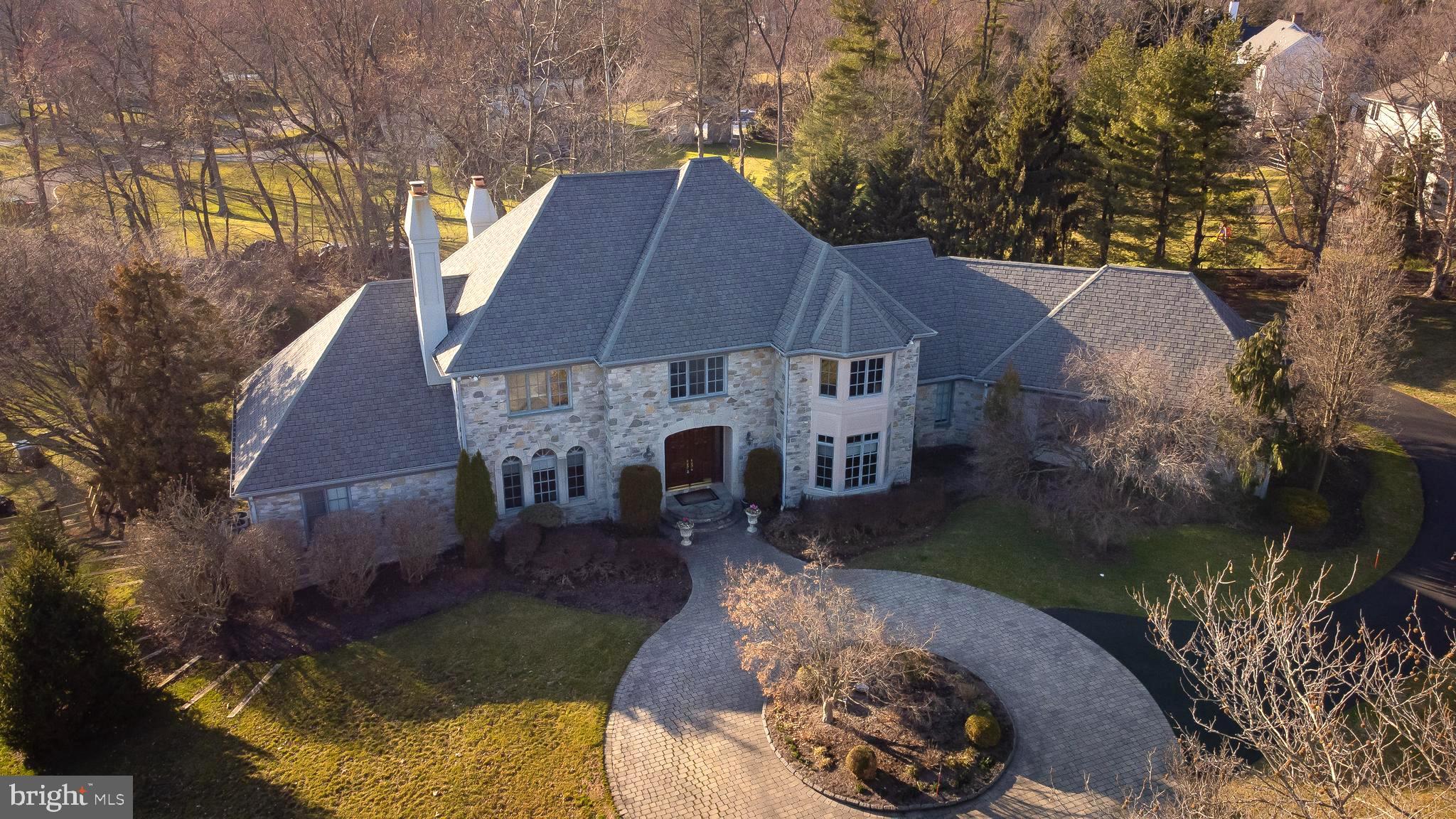 Lux·u·ry: /ˈləkSH(ə)rē,ˈləɡZH(ə)rē/ The meaning of LUXURY is a condition of abundance or great ease and comfort. The definition of luxury has been achieved in this exquisite Ann Capron designed, French Country home offering MAIN FLOOR living providing the owner with both ease and comfort without sacrificing the amenities that are often lacking in homes offering a Primary Suite on the first floor. Luxury doesn’t come without a price, and Luxury has few options in the Blue Bell area. Think you can find a lot and build your dream home elsewhere? Good luck! Land values are higher than we’ve seen in years and so is the cost to build. This home’s offering at less than $260 per SQ FT is nothing short of a BARGAIN! It’s also nearly impossible to find a cul-de-sac of equally spectacular homes in proximity to transportation including access to major roadways, rail, and aviation. Are you a shopper? There are great options to fulfill your day-to-day needs, and it takes less than 20 minutes to arrive at the fifth-largest shopping mall in the United States which (of course) you’ll need to decorate this HOME SWEET HOME offering 6,225 SQ FT of living space. The charming, walking town of Ambler is only minutes away and is host to wonderful boutique shops, some of the best restaurants in Montgomery County and one of the oldest theaters in the country. Want to know more? Call for your tour TODAY!