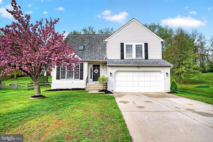 Beautifully renovated (2024), maintained, and move-in ready 3BR/2f-2hBA multi-level home on a manicured lot in the desirable neighborhood of Royal Heights.  Pull into the double wide driveway, park just steps from the stunning blooming Cherry Tree and landscaped beds, and make your way to the front door of your new home. Step inside to a home filled with natural light, recessed lighting, luxury flooring, new carpeting, and four spacious floors of living space.  The main entrance opens into the grand living room, which features a vaulted ceiling, skylights, and an open view of the second-floor landing.  Just off the living room are the spacious dining room and kitchen. The stunning kitchen features mixed metals with gold accents, stainless steel appliances, sleek quartz countertops, and a shiplap backsplash. It offers plenty of cabinets finished with crown moldings, a separate pantry closet, a bank of cabinets that includes a desk area, and a corner stainless sink providing a view into the breakfast nook and the family room.  Take a few steps down into the oversized family room, which features a vaulted ceiling and new carpeting. Tucked behind it you will find the main floor laundry, a half bath and garage access. The staircase to the second floor leads to a catwalk that offers views of both the living room and family room.  On the right of the catwalk are two spacious secondary bedrooms, and a newly remodeled full bath.  To the left is the private owner's suite, which features a grand sized bedroom with a large picture window, two oversized closets, and a private en-suite.  The primary bath features a deep soaking tub, a double sink vanity, and a large walk-in shower.  The lower level, which is the last floor of finished living space, features a half bath, a room ideal as a home office, and a large recreation room for the entire family to enjoy.  From the breakfast room, step through sliding doors onto a two-tiered deck with a roll-up awning, which leads to a lush green yard with a shed and a custom greenhouse.  This move-in-ready home is ideal for any new homeowner and is located near shopping, restaurants, and commuter routes. Less than 10 minutes from Otter Point boat ramp & marina!