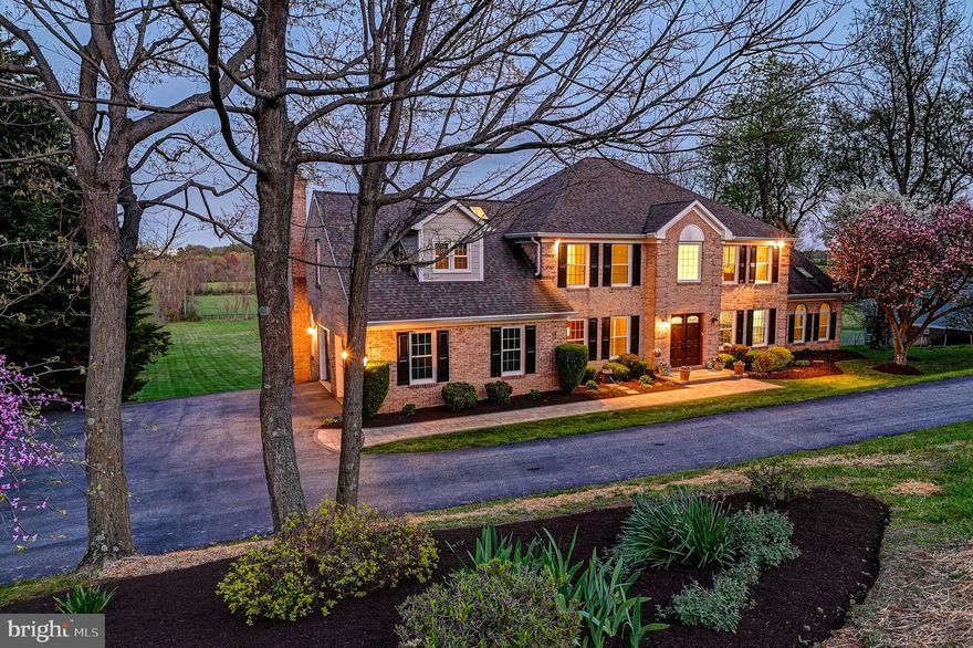 Discover Elegance at 5930 Clifton Oaks Drive.  Nestled in the serene landscape of Clarksville, this beautiful brick home offers a perfect blend of luxury and comfort. Boasting 5 bedrooms, 3.5 bathrooms, and a two-car garage on 3.29 acres, this residence is a true testament to pride in ownership. Step inside and be greeted by the gourmet kitchen, a chef's dream featuring custom cabinets, granite countertops, and high-end appliances. The kitchen's focal point is a picture window that frames breathtaking views of the expansive grounds and trees. Entertain guests in the spacious dining room that features three sets of French doors and a bay window. Adjacent to the dining room, a huge bonus room awaits, offering a perfect space for relaxation or play. This bonus room provides access to one of two new large decks, perfect for outdoor entertaining or enjoying the scenic views. Upstairs the primary suite, a luxurious retreat, features a brand-new stunning bathroom. The highlight of the bathroom is the walk-in shower, a sleek and spacious sanctuary with custom tile work and modern fixtures. Adjacent to the shower is a floating tub, inviting you to soak and unwind in style. This contemporary freestanding tub is the epitome of luxury, offering a peaceful retreat to relax and recharge. Three additional bedrooms, including one with a secret Narnia hideaway, and another new, full bathroom complete the upper level. The lower level has been thoughtfully renovated to include a private bedroom, newly painted walls, new luxury vinyl plank flooring, and ample storage space. This home has been meticulously maintained, with recent upgrades including new windows, roof, gutters with gutter guards, decks, shutters, and professional landscaping. Outside, the 3.29 acres offer endless possibilities, including the potential for a pond, tennis courts, or any other feature you can imagine. Two new large decks off the kitchen and bonus room provide ample space for outdoor entertaining or simply enjoying the natural beauty of the surroundings. Experience the epitome of luxury living and explore the vast potential of 5930 Clifton Oaks Drive. Schedule your private tour today and prepare to be impressed.