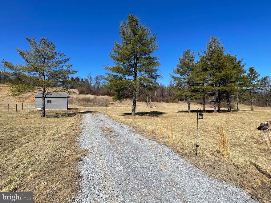 Are you looking for a quiet location in the country to build your dream home? This beautiful 5.93 acre lot may just be the place and needs a buyer with a great home plan. Much of the work has already been done with the well and 3-bedroom septic in place. There is also an area that has been partially excavated for a home. The lower and upper part of the lot are fairly level. Many of the trees have already been removed but plenty remain making it a perfectly balanced site. There is also a newer 2-vehicle metal garage already in place on a poured concrete pad. This is a great opportunity so don't wait! Schedule your showing today!