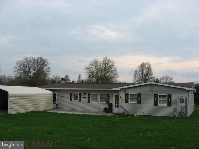 Come home to this adorable three bedroom rancher. Many tasteful updates have been done making this charming home move-in ready at a very affordable price. Relax or entertain on the spacious covered patio and enjoy the lovely backyard with lots of space to garden or play. The lot consists of two half acre parcels. Large shed for extra storage. Enclosed garage is perfect for added storage but could be finished to suite your personal needs. Once you see it you'll want to own it! Call for a showing today.