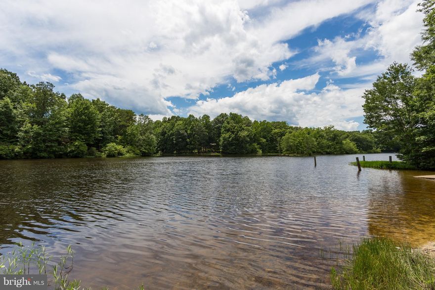 Beautiful waterfront home in sought after Lake Wilderness. This home boast an open floor plan, dramatic 2 story fireplace, fantastic remodeled kitchen, first floor master, and wrap around deck to enjoy all the spectacular views this lot has to offer! There's tons of room to spread out on this property including a detached huge 2 car garage and workshop w/ upstairs loft area. Must See!