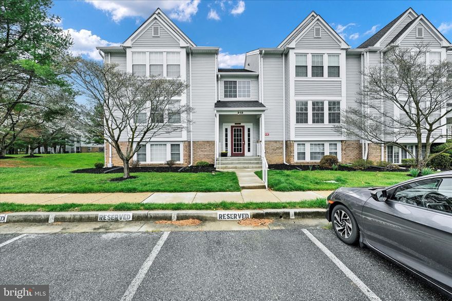 Beautiful, second floor condo with open concept layout and abundant natural light, move in ready! This condo features a large living room and dining room, perfect for entertaining. The kitchen has matching appliances including the refrigerator, stove, and dishwasher. Great counter space and breakfast bar! The primary bedroom features tons of natural light and great closet space. Enjoy relaxing on your private balcony that backs to trees in the evening or for your morning coffee. Conveniently located near shopping, dining and parks!