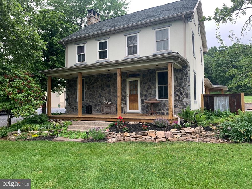 Beautiful 1880s farmhouse with 3100 sq ft and covered wrap around porches on 1.64 acres with 40x50x16 -3 bay garage.  This spectacular one-of-a-kind property has 4 bed/2.5 baths and will surprise you with its charm and spacious rooms.  Sellers have left no stone unturned in renovating this home.   Updated plumbing, electric, central air, heating, 50-year roof, new sandmound septic installed and wood burning fireplace with stainless steel liner.  Sellers also put on an addition for the kitchen/dining area and primary bedroom and bath.  Kitchen has plenty of storage in its solid maple cabinets with granite countertops, gas stove and tile floors. Large laundry room with cabinets and tile floor.  Bathrooms are updated with tile tub and showers and claw foot tub in primary bathroom.    Property also boasts beautiful hardscaping, wrap around concrete porches an oversized 40x50x16 ft high 3 bay garage with water, plumbing for bathroom and plenty of storage in the upstairs.   This property will not disappoint.