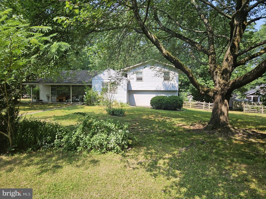 Perfect opportunity to own a single family home in Springfield on a half acre corner lot for less then 600k.  Open house on Sat 6/24/23 from 1 to 4 pm. Offers will be reviewed on Sunday 6/25/23. Owner has the option to accept an offer before review date. Home needs work, but has lots of potential, Home sold "As Is".  Nice front porch ready to have your morning coffee. Offers 3 levels, 3 bedrooms, one on mail level, one lower level and huge primary suite on upper level.  Sunroom/ laundry area off kitchen. Home is livable while you are doing the projects to make it your own design. The value is in the land, you may be ready to build your custom dream home on this beautiful corner lot. Close to shopping, dining, Metro and commuter routes. This is a Rare find,